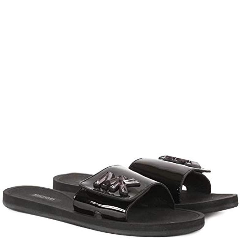 black patent sliders