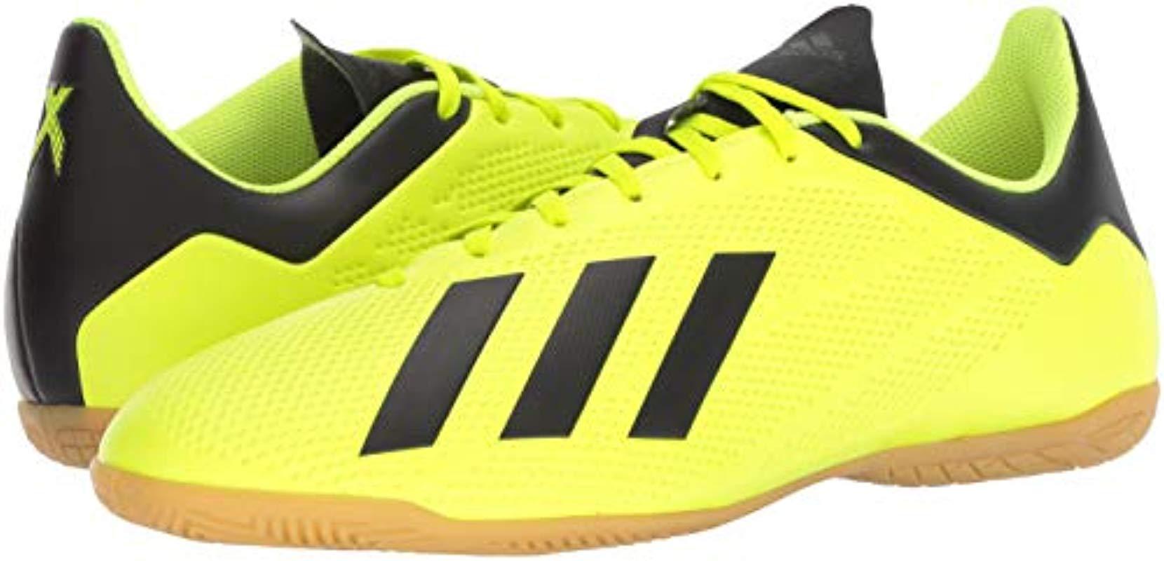 yellow adidas soccer shoes
