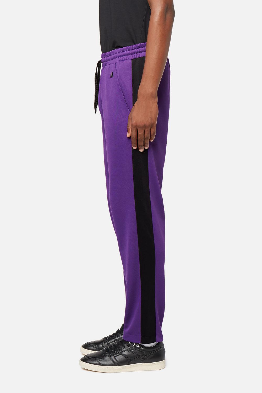 black and purple track pants
