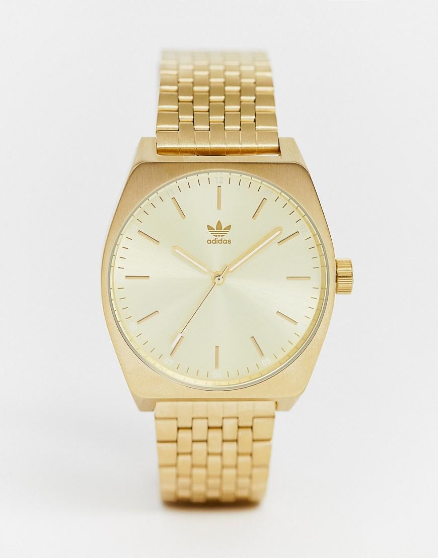 adidas relojes dorado