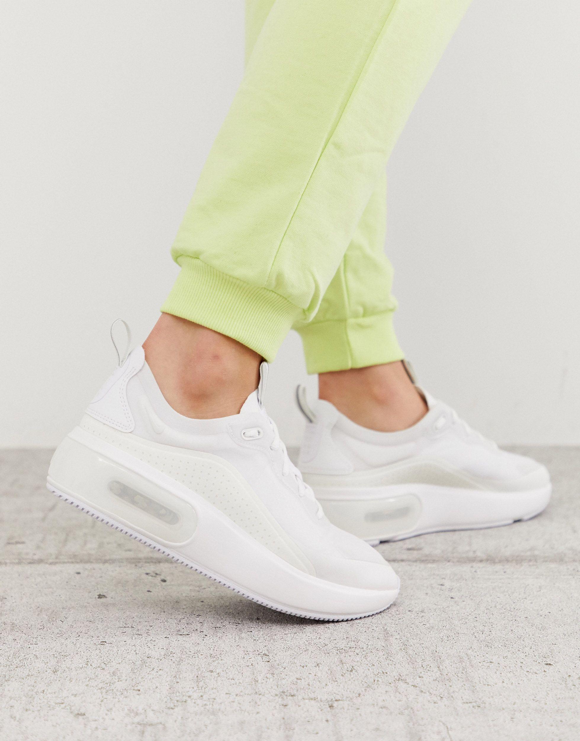 white nike dia