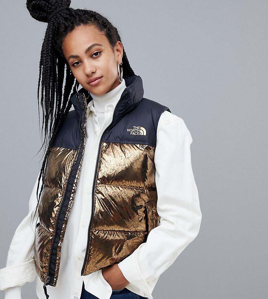 north face gold vest