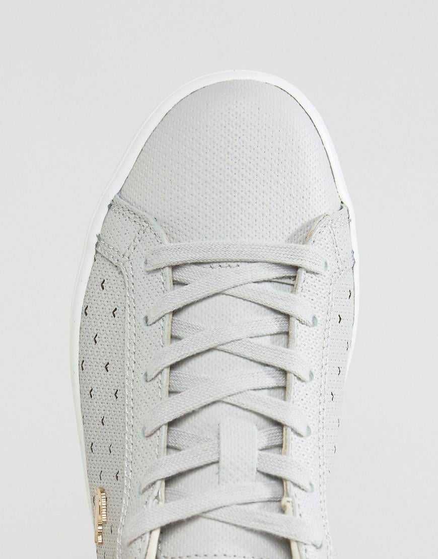 lacoste gold croc