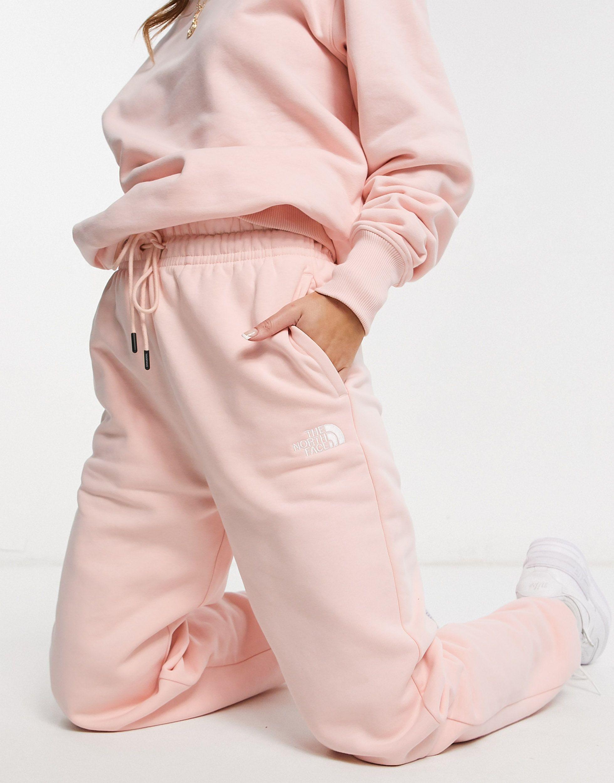 The North Face Oversized Essential jogger in Pink | Lyst