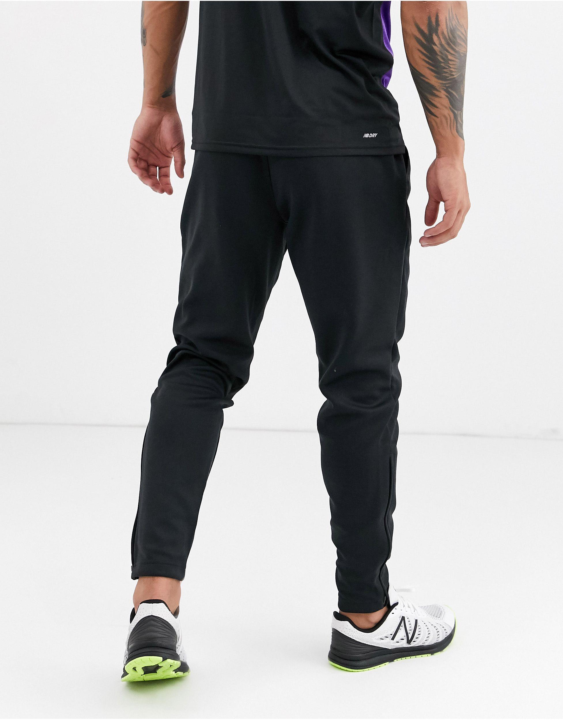 new balance running tenacity slim fit joggers in grey