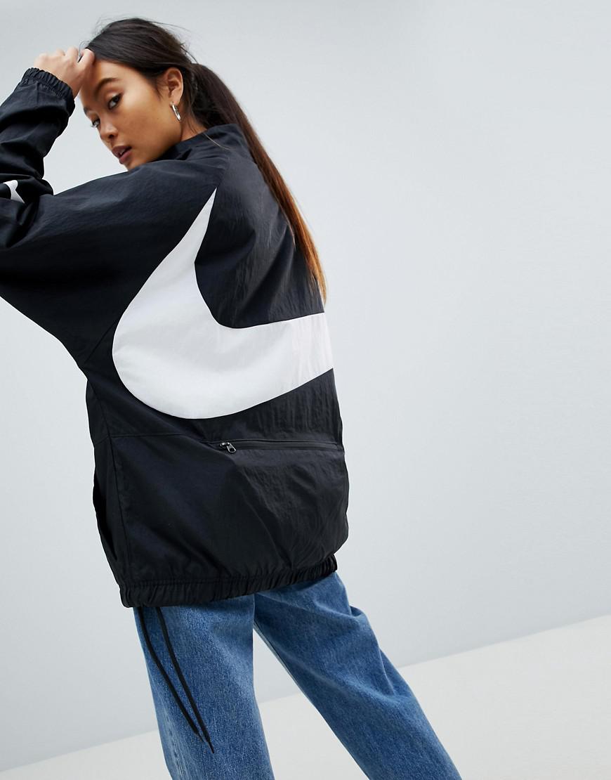 Veste de survtement oversize demi-fermeture clair avec grand logo virgule  Nike en coloris Noir - Lyst