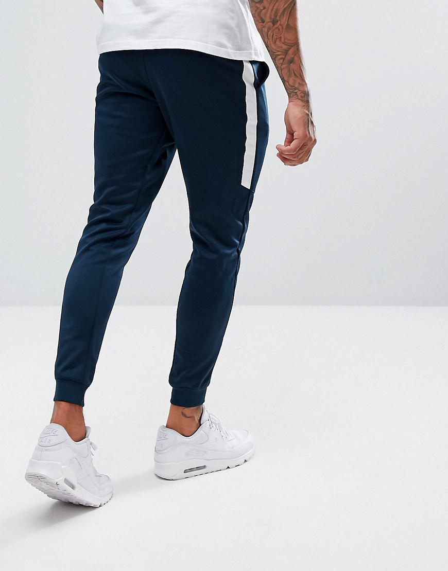 nike tribute cuffed joggers in navy