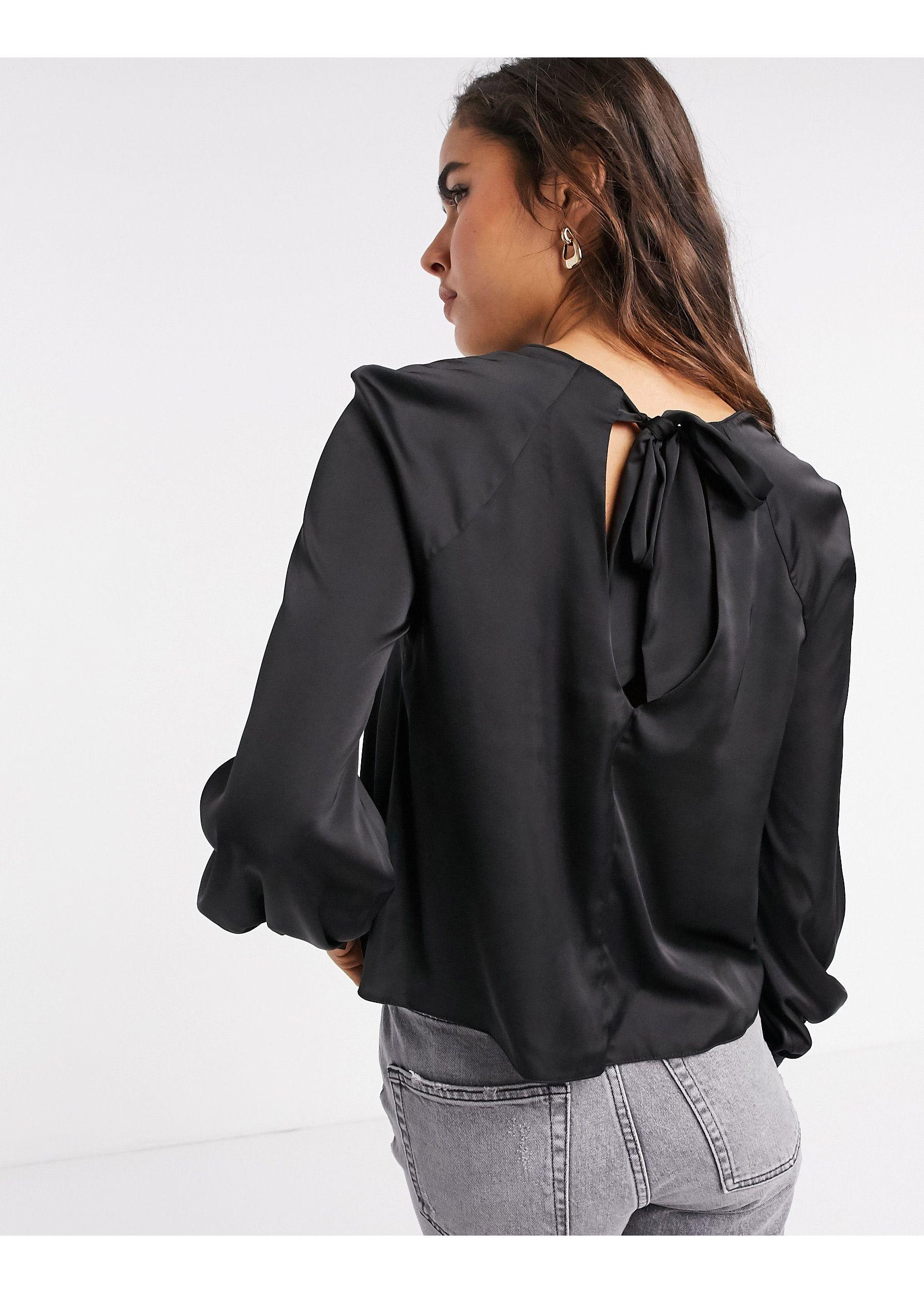 black blouse with balloon sleeves