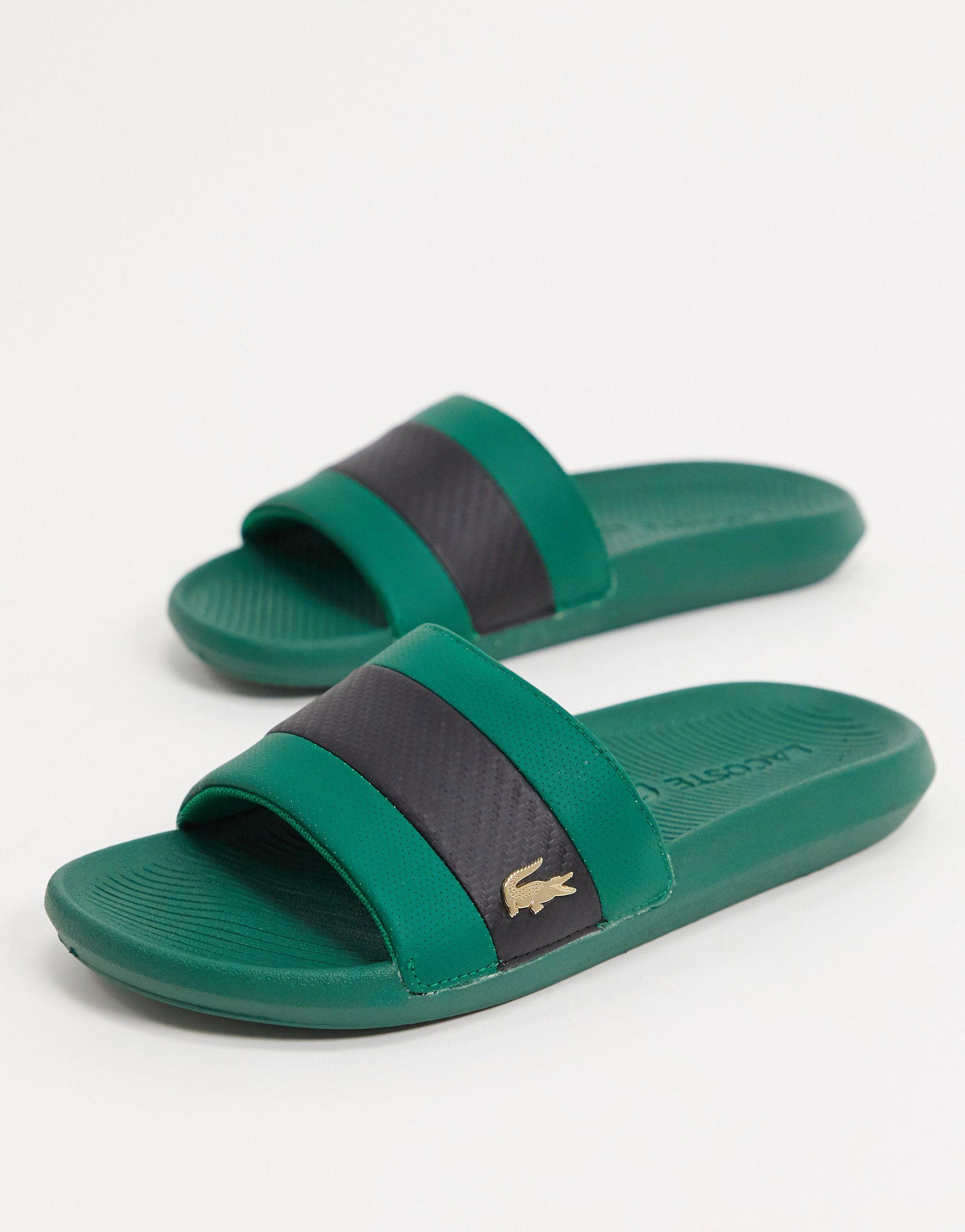 lacoste flip flops green