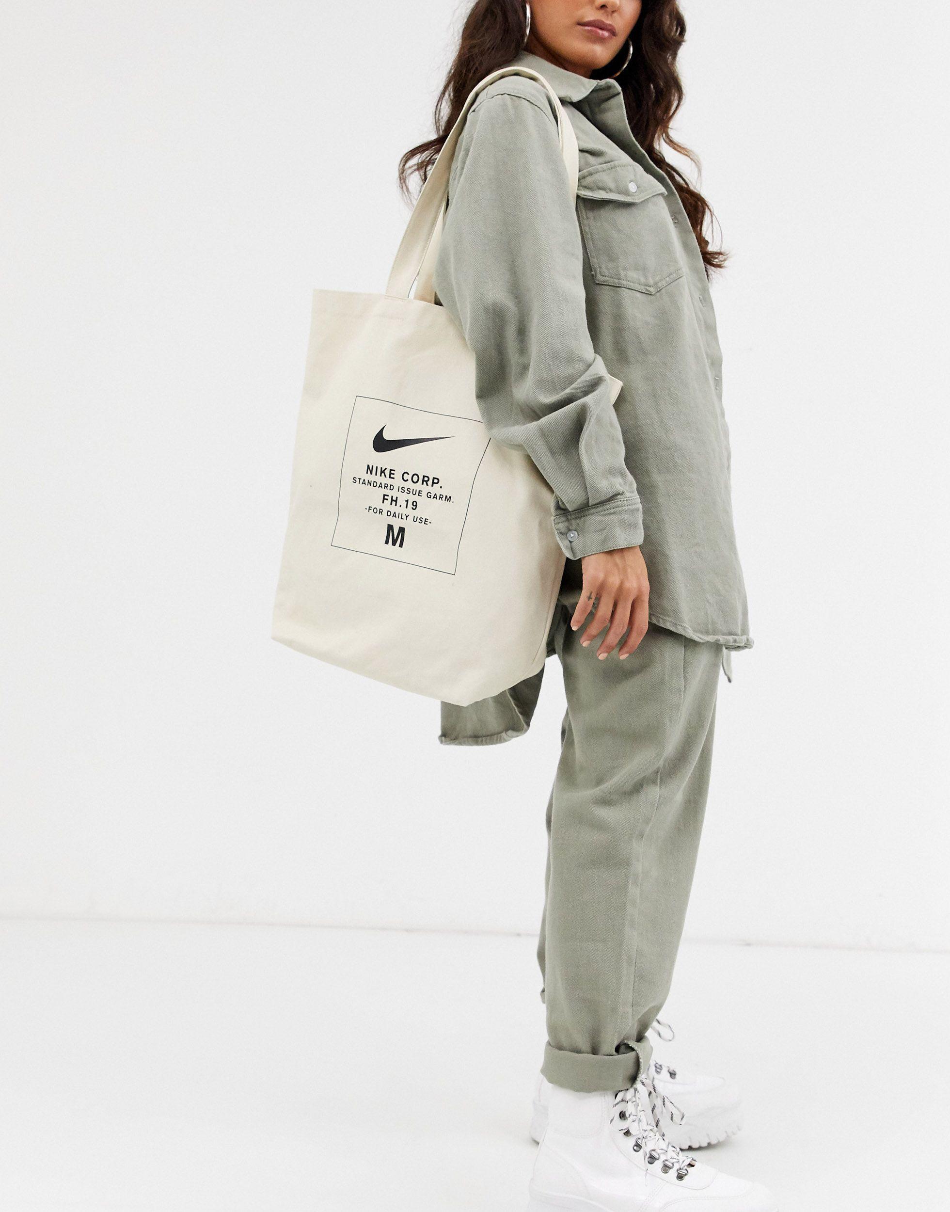 Nike swoosh tote bag in stone sale