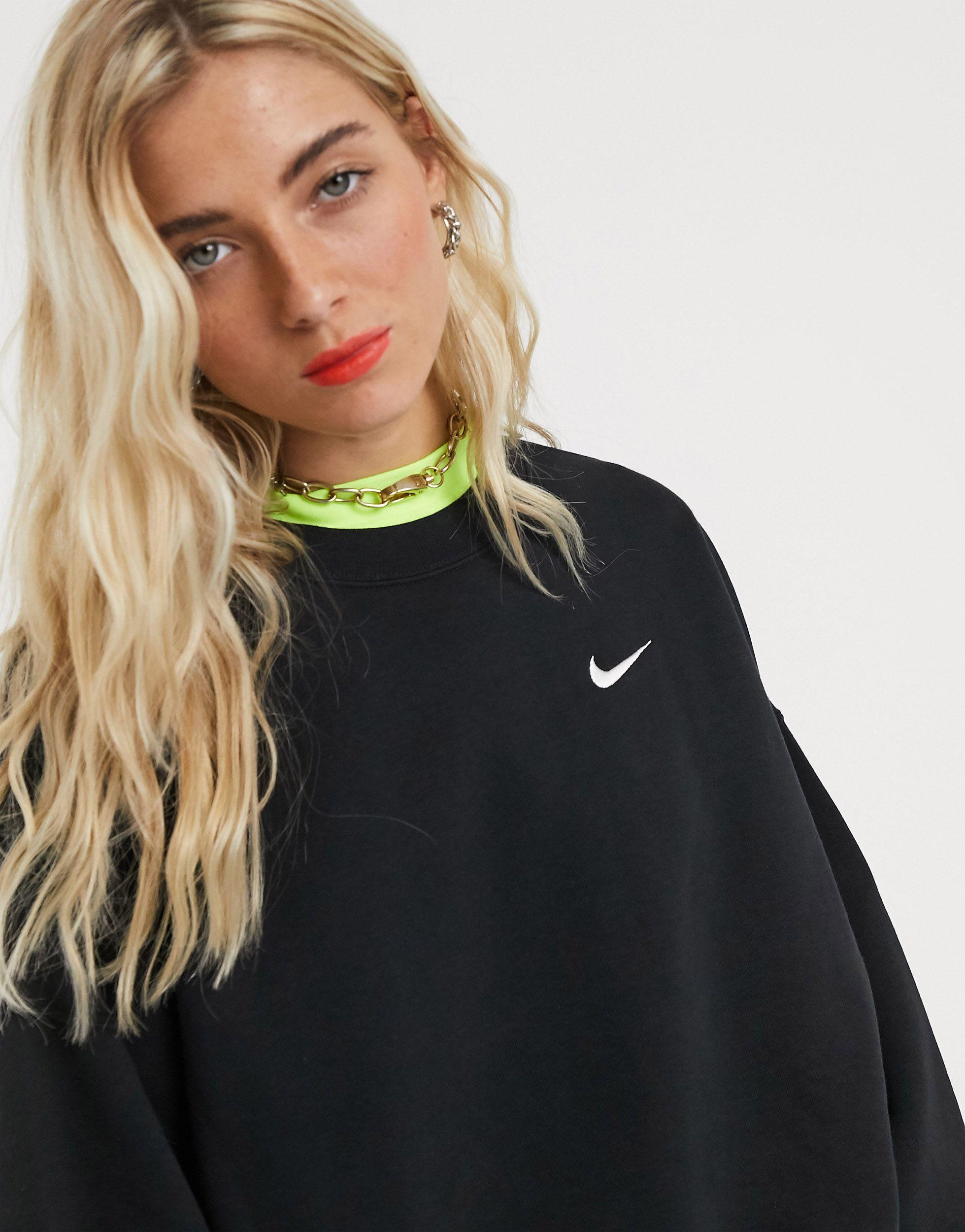 nike mini swoosh oversized hoodie in black