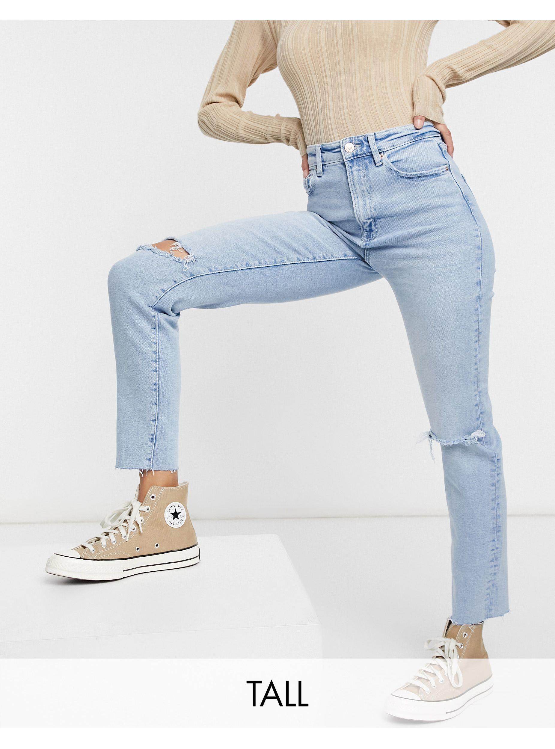 Stradivarius Denim Tall - Smalle Mom Jeans Met Scheuren En Stretch in het  Blauw - Bespaar 21% - Lyst