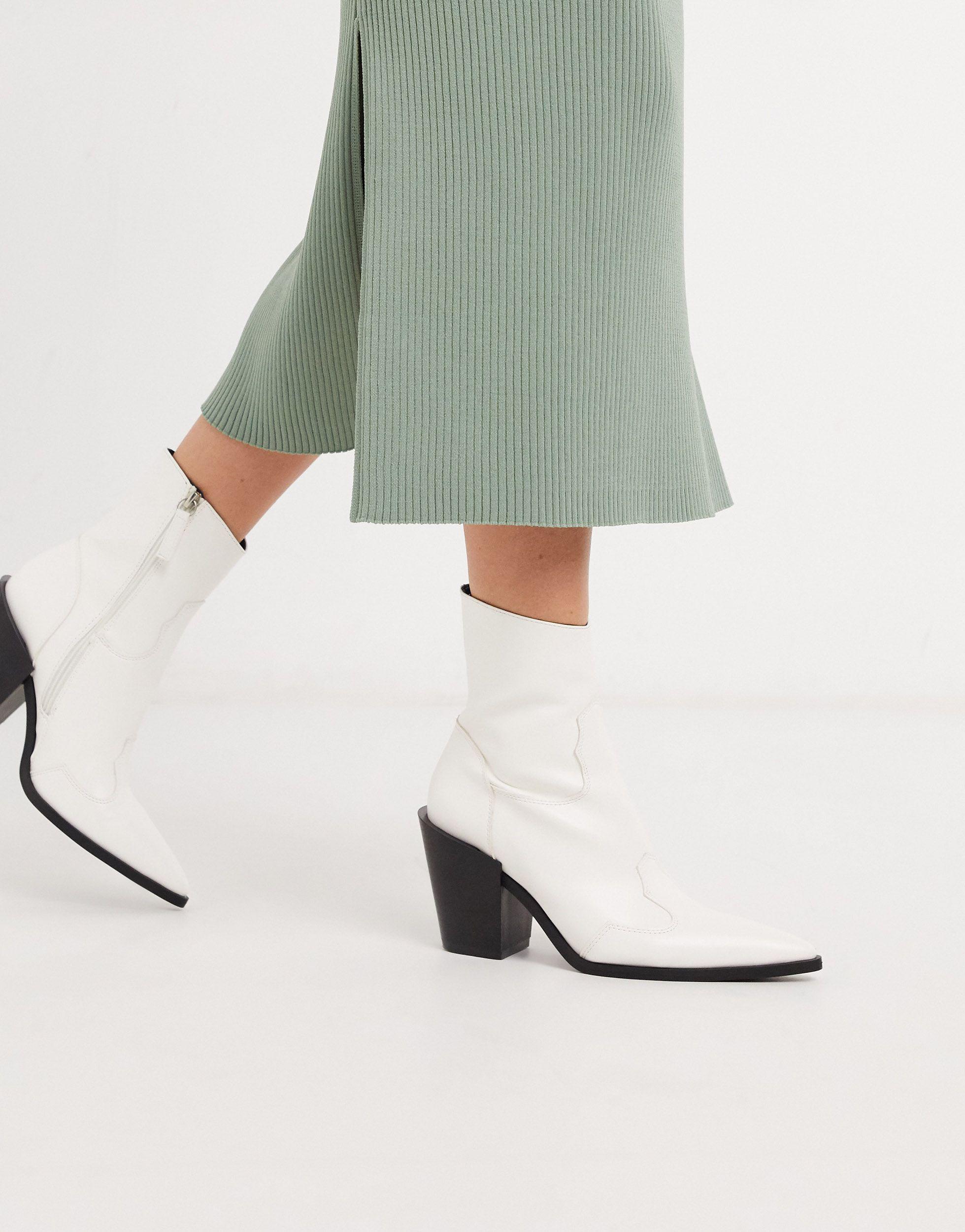 pointed white boots