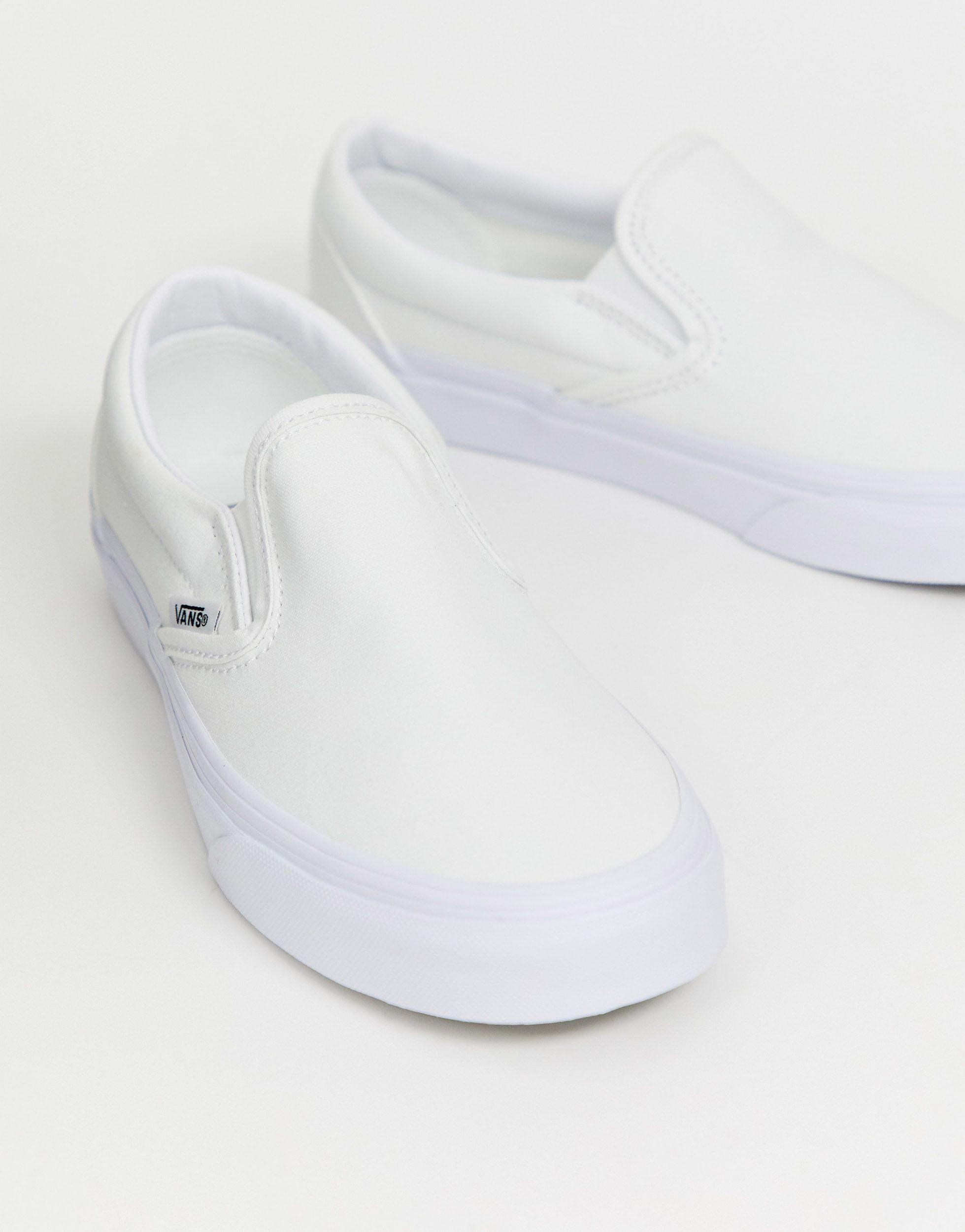 vans slip on triple white