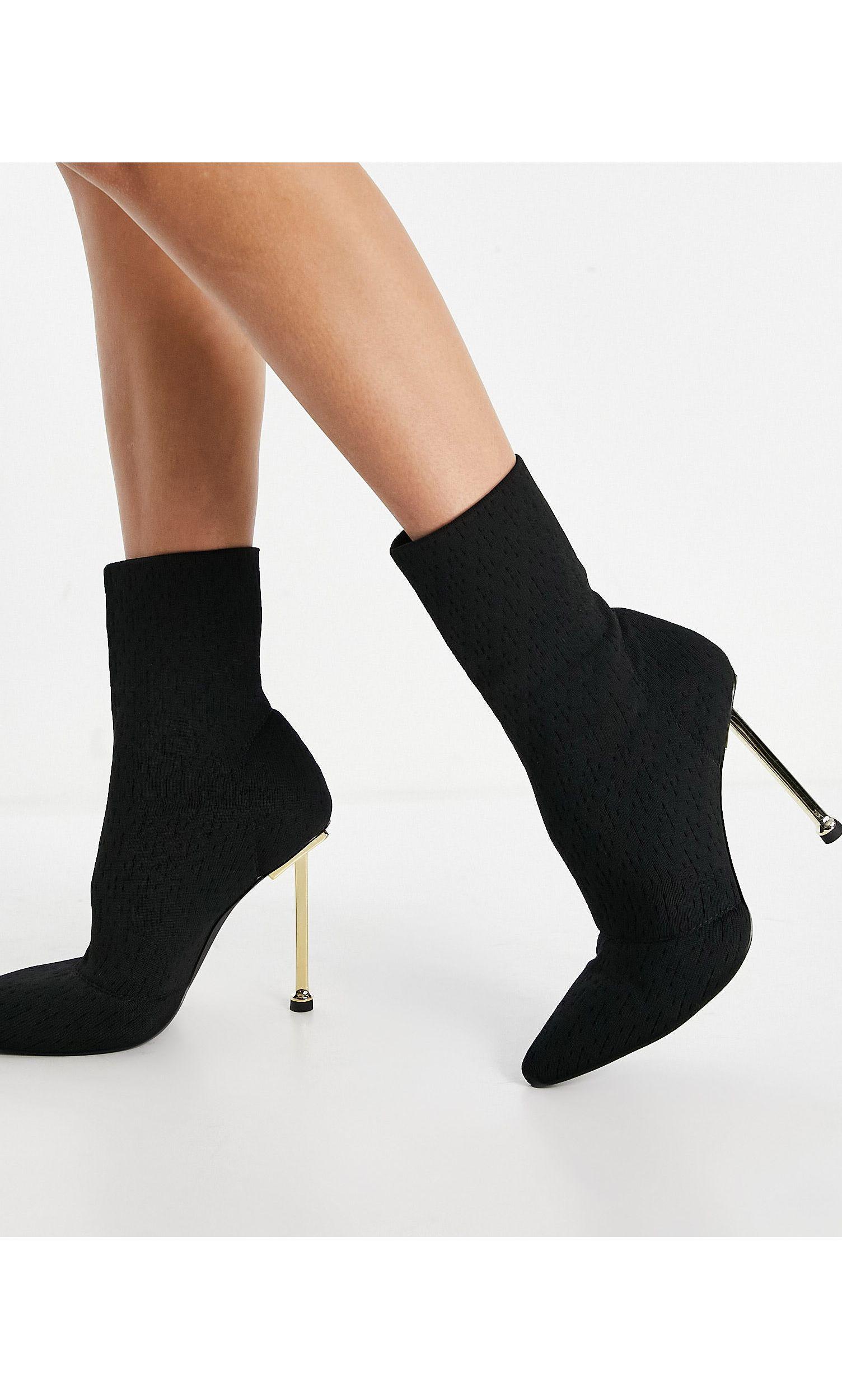 Botas negras estilo calcetín con tacón dorado shae SIMMI Shoes de color  Negro | Lyst