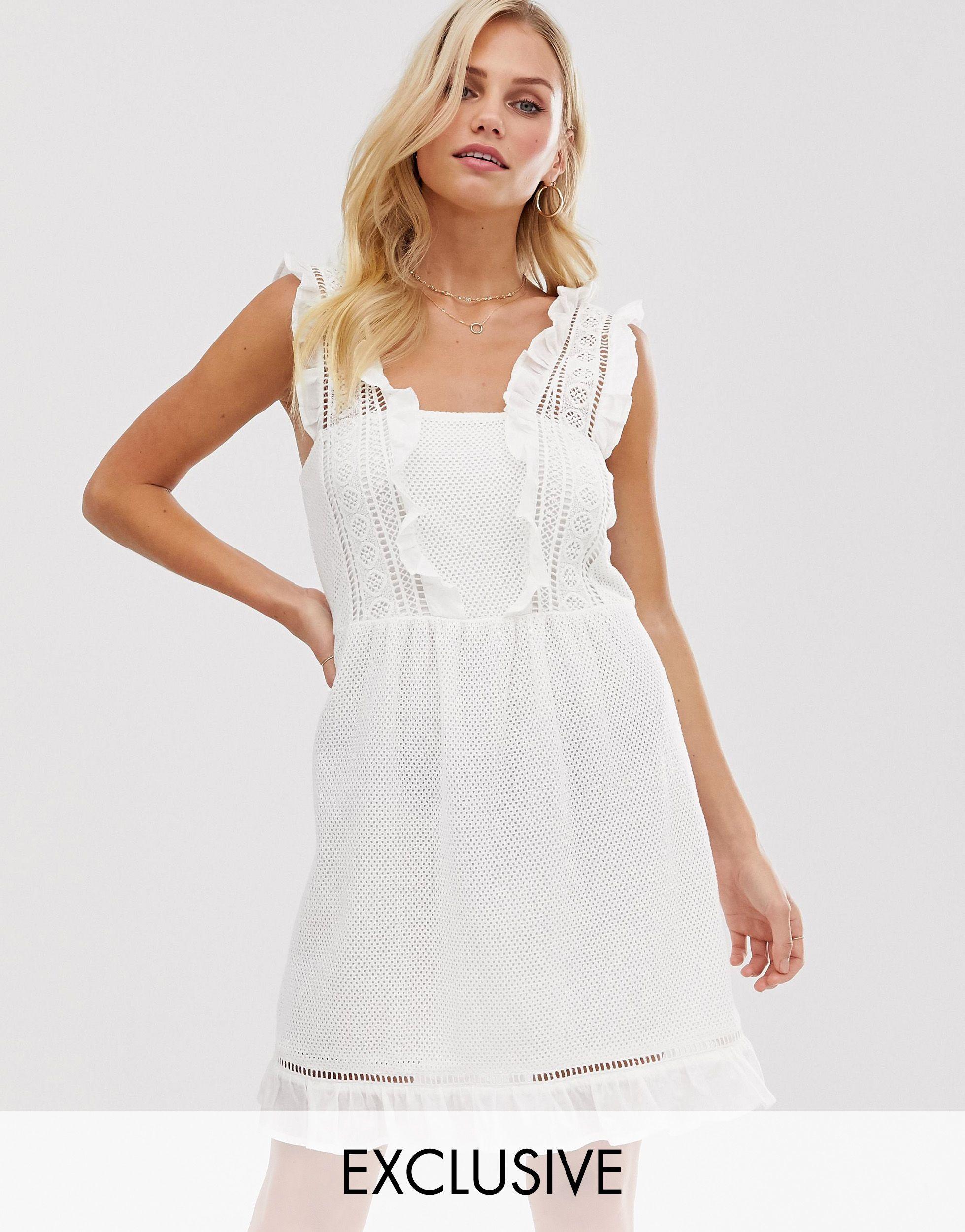 Mango wrap detail mini dress in white broderie Clearance
