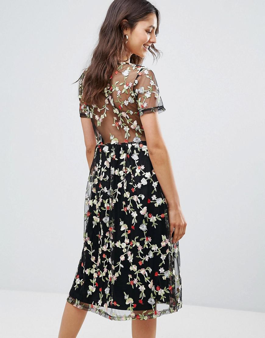 black midi dress with sheer sleeves