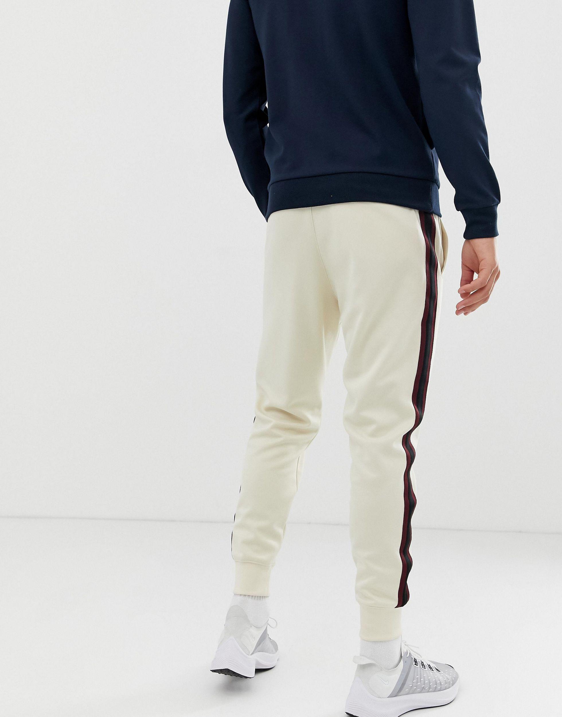 Nike Katoen Tribute - Joggingbroek in het Naturel voor heren - Lyst