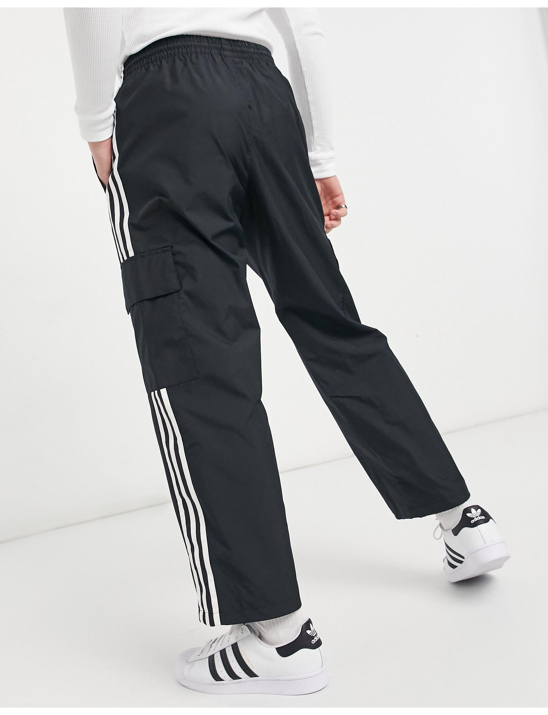 adidas Originals Adicolor Three Stripe Cargo Trousers With Pocket Detail in  Black for Men | Lyst