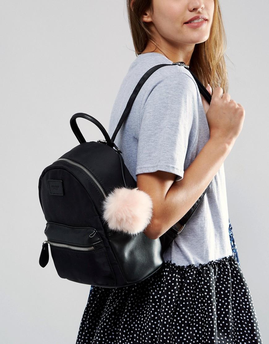 mini backpack with pom pom