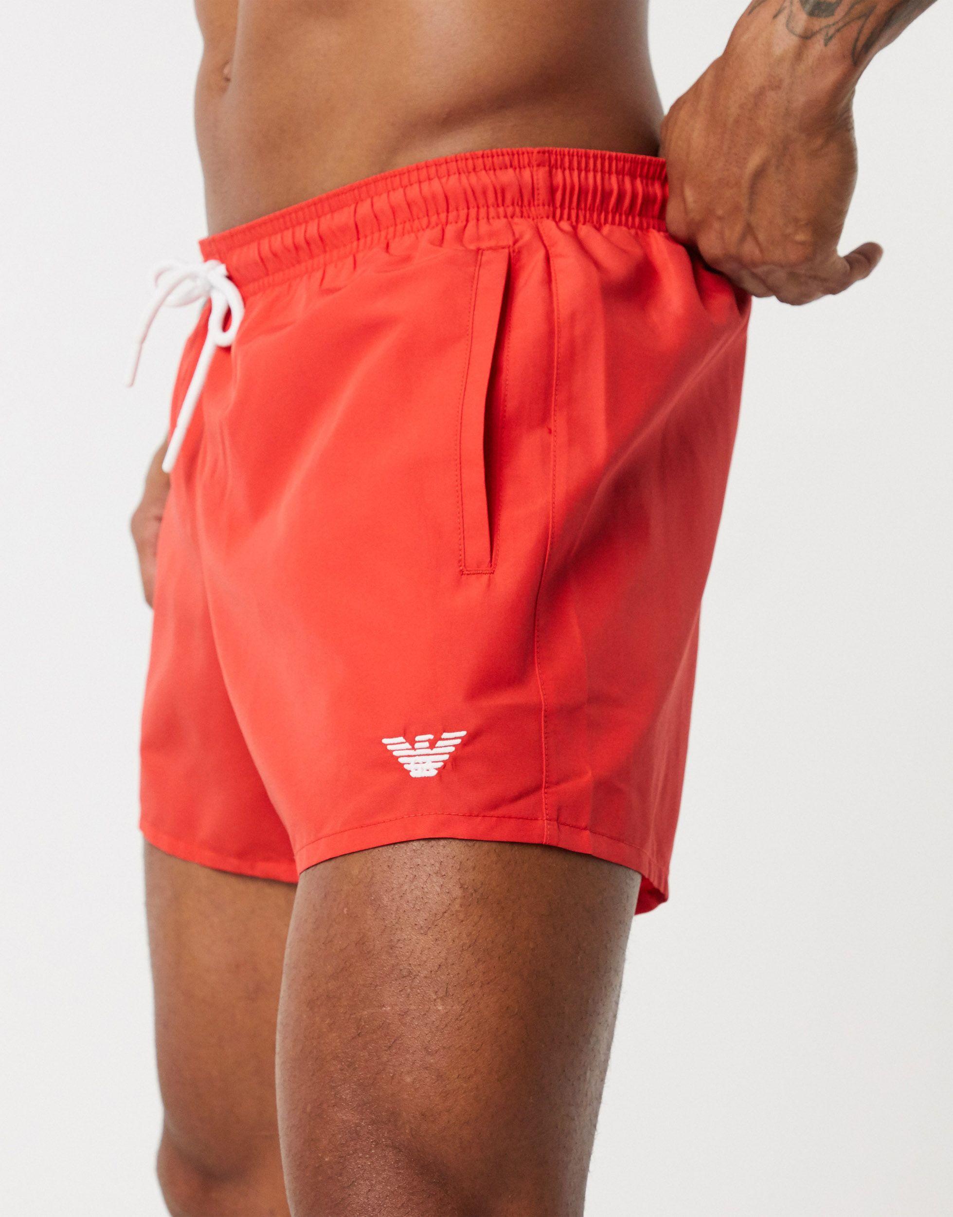 red armani shorts