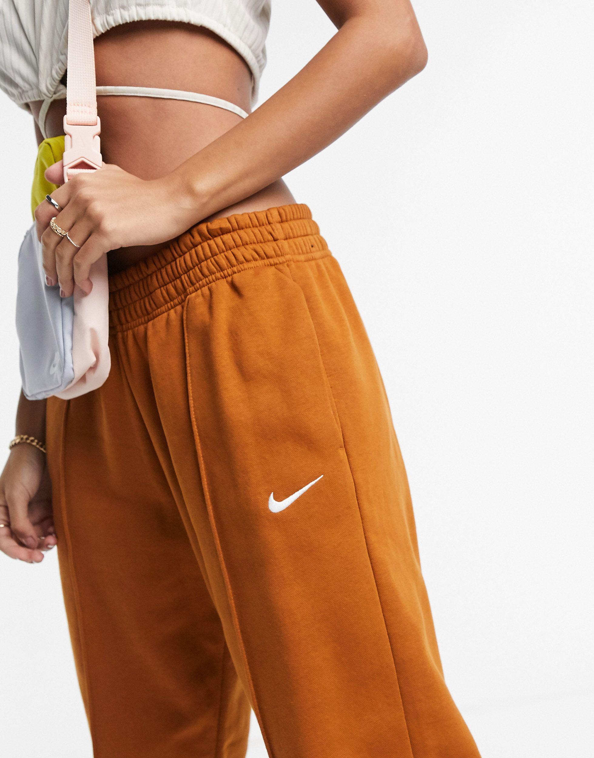 nike mini swoosh oversized sweatpants in cream