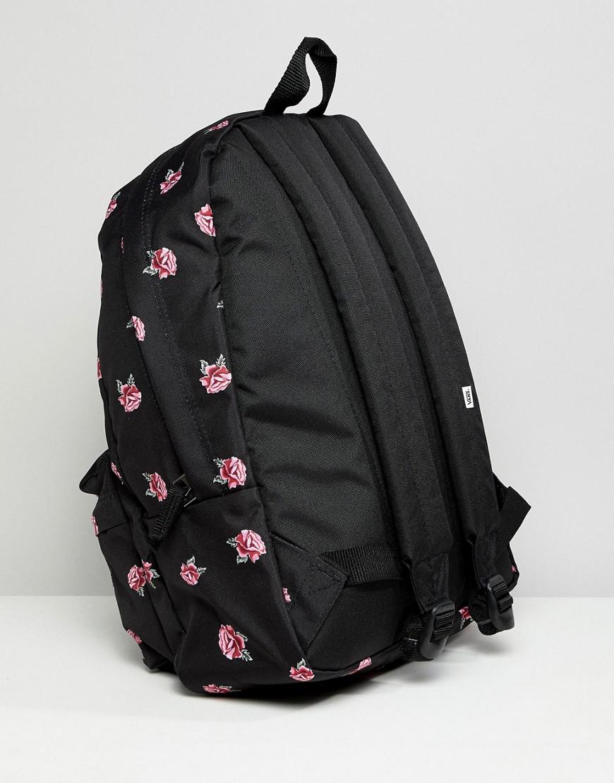 vans realm backpack in black floral print