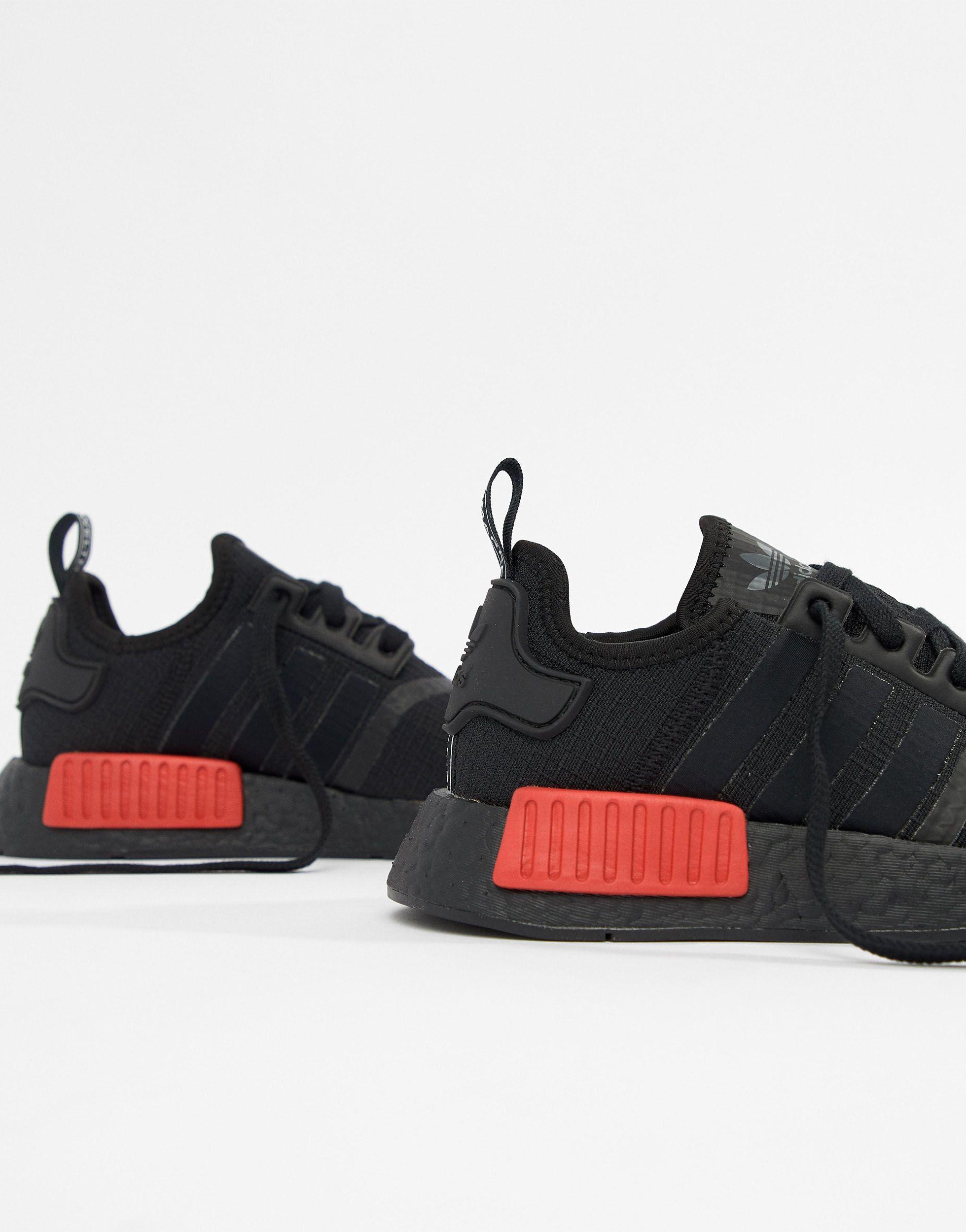 adidas originals nmd r1 trainers in black with red heel block