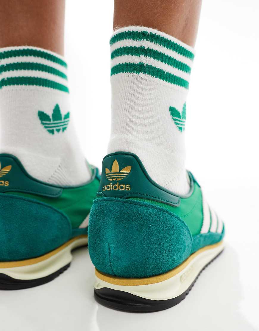 teal green adidas