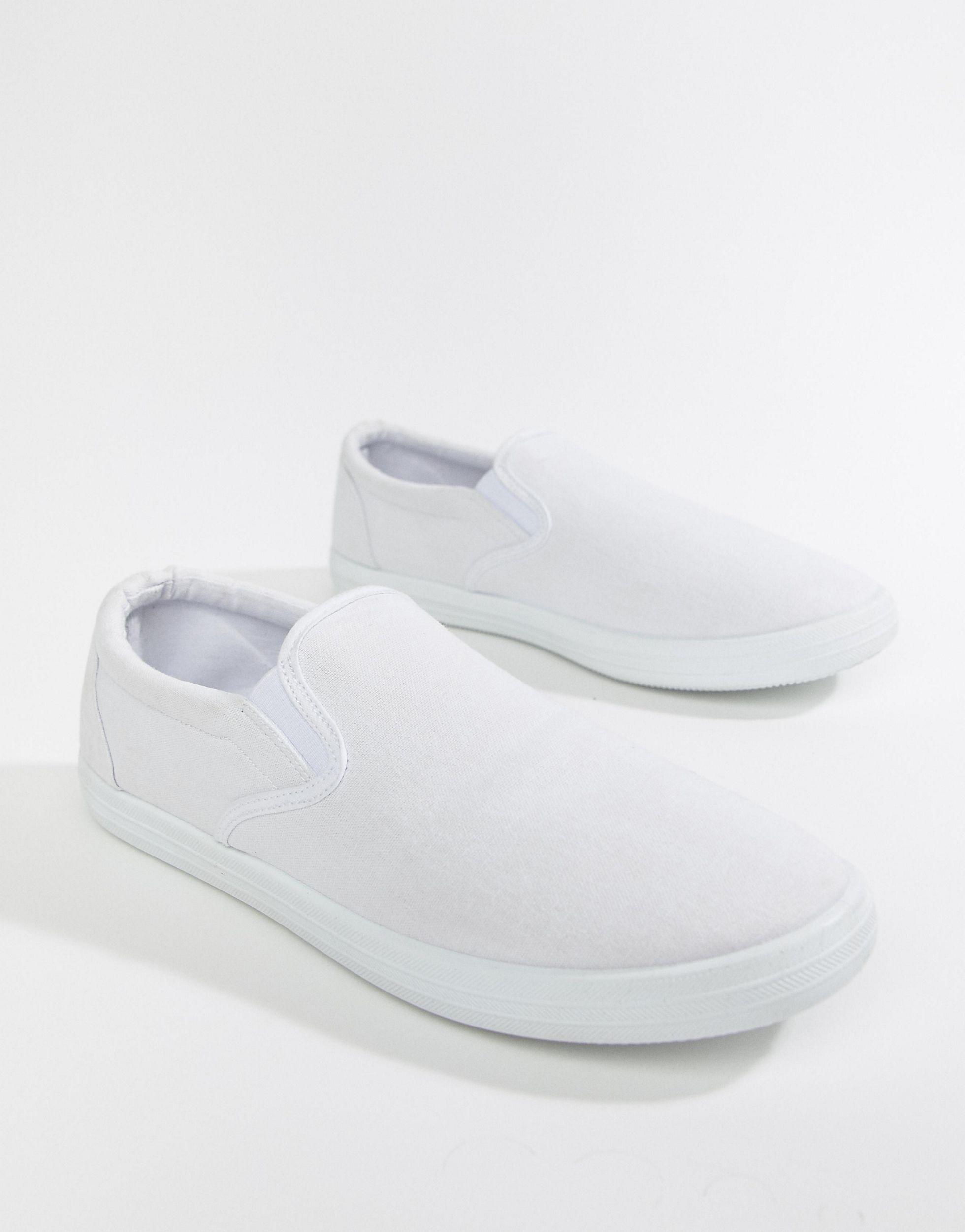 white slip on plimsolls