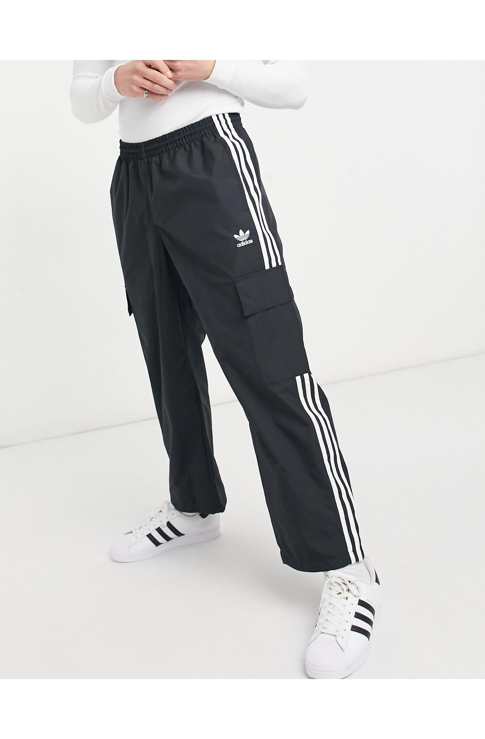 adidas Originals Adicolor Three Stripe Cargo Trousers With Pocket Detail in  Black for Men | Lyst