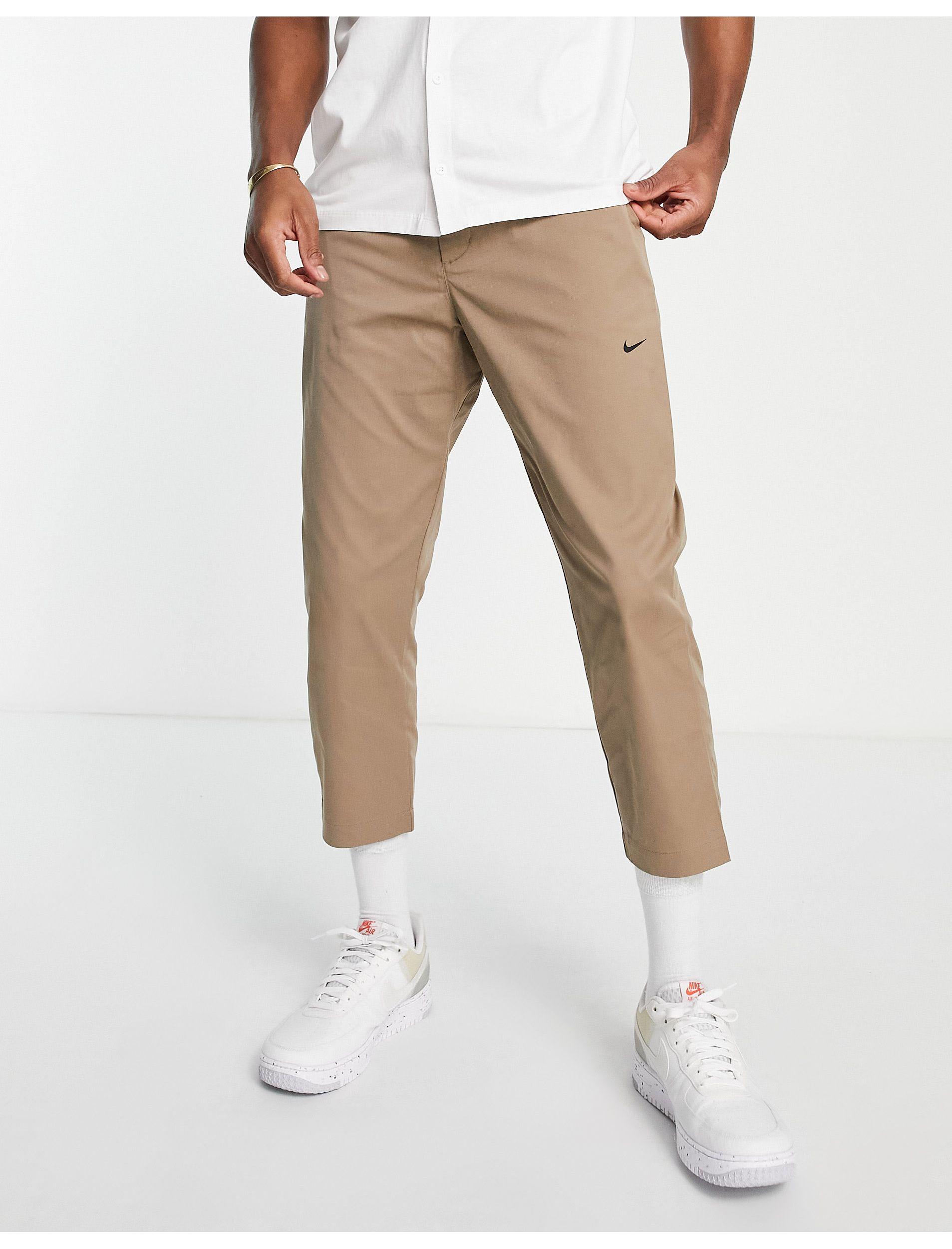 Nike Men's Neutrals Cropped Pants - Sportswear Style Essentials Woven  Unlined Sneaker Pants - ShopStyle Trousers
