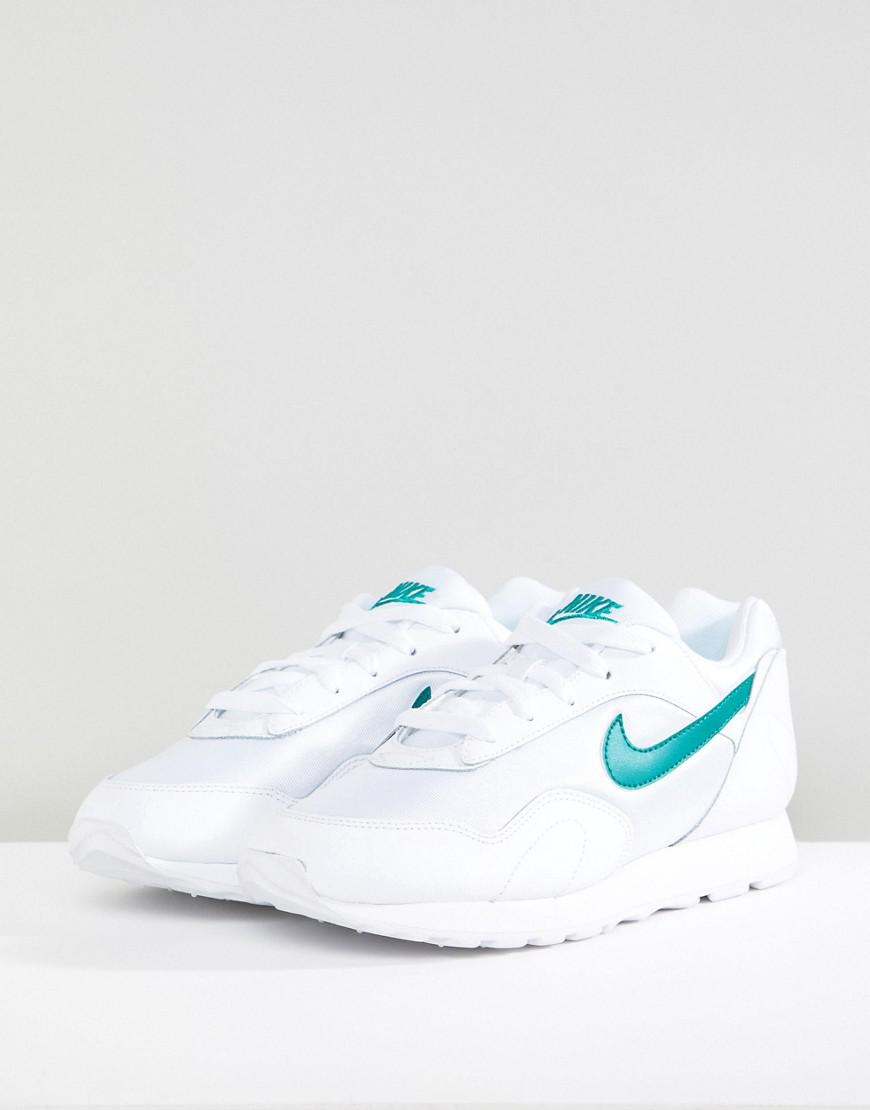 nike outburst trainers in white and pink