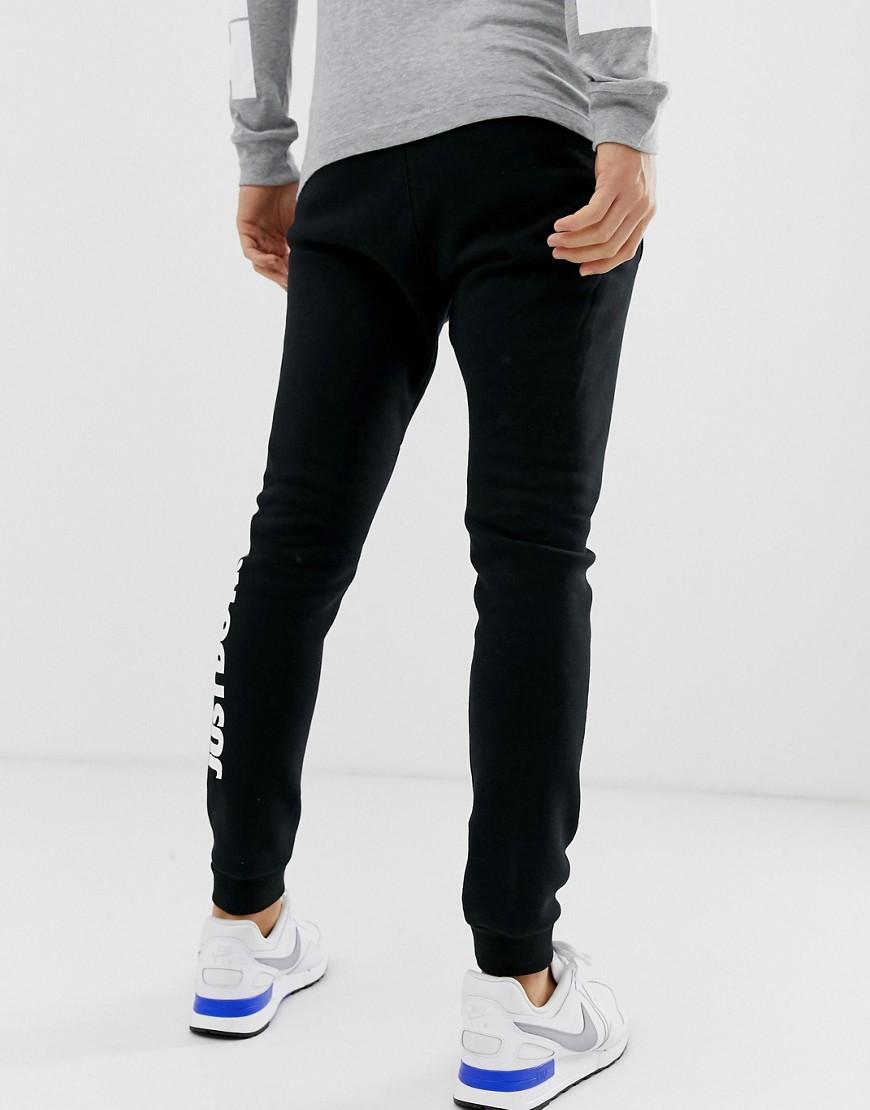 Nike Just Do It Fleece Joggers in Black for Men | Lyst UK
