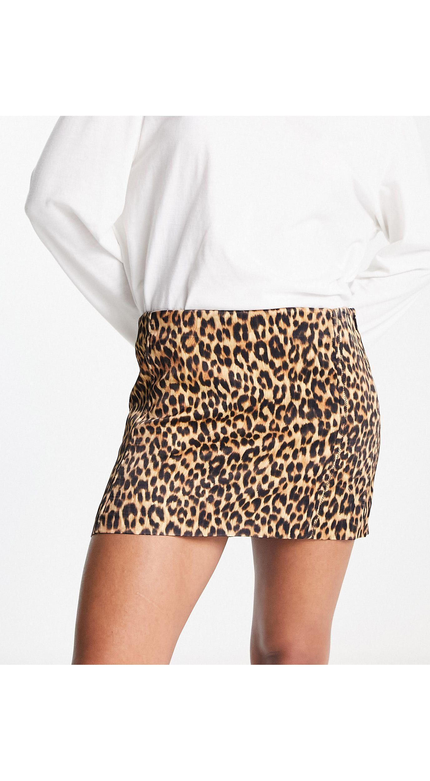 Mini-jupe taille basse à imprimé léopard Mango en coloris Blanc | Lyst