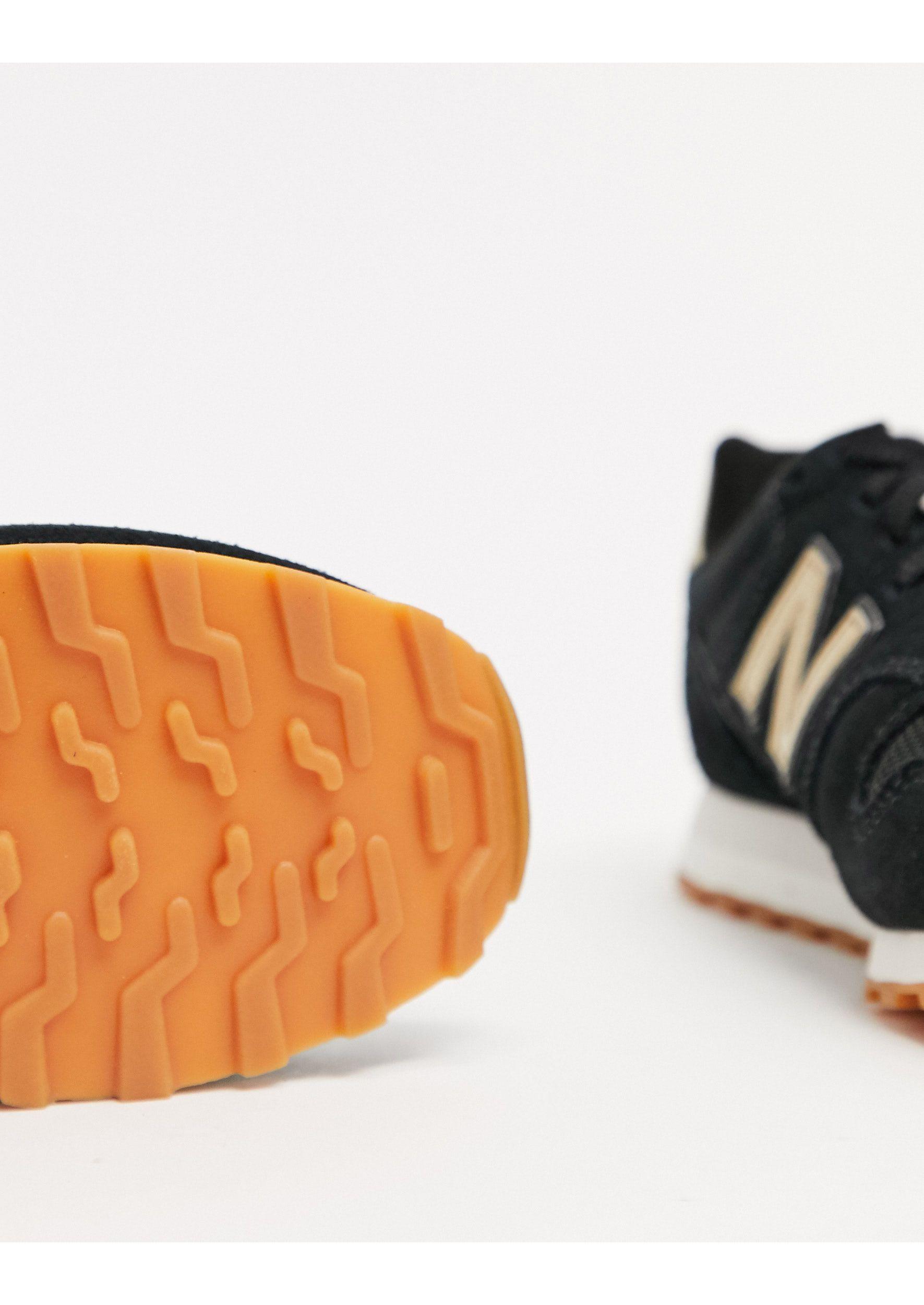 new balance 373 black orange