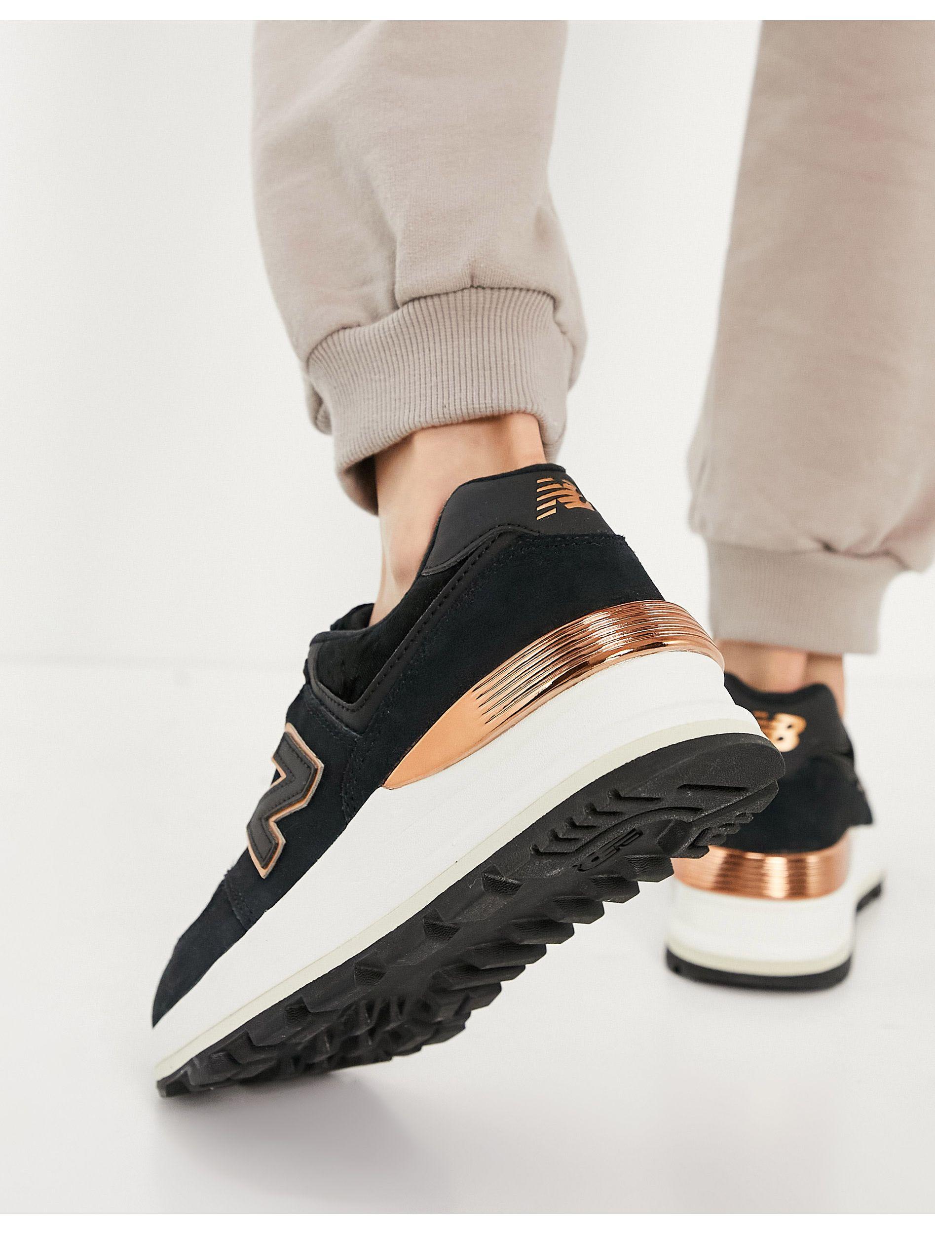 574 - sneakers nere e oro rosa con zeppa di New Balance in Nero | Lyst