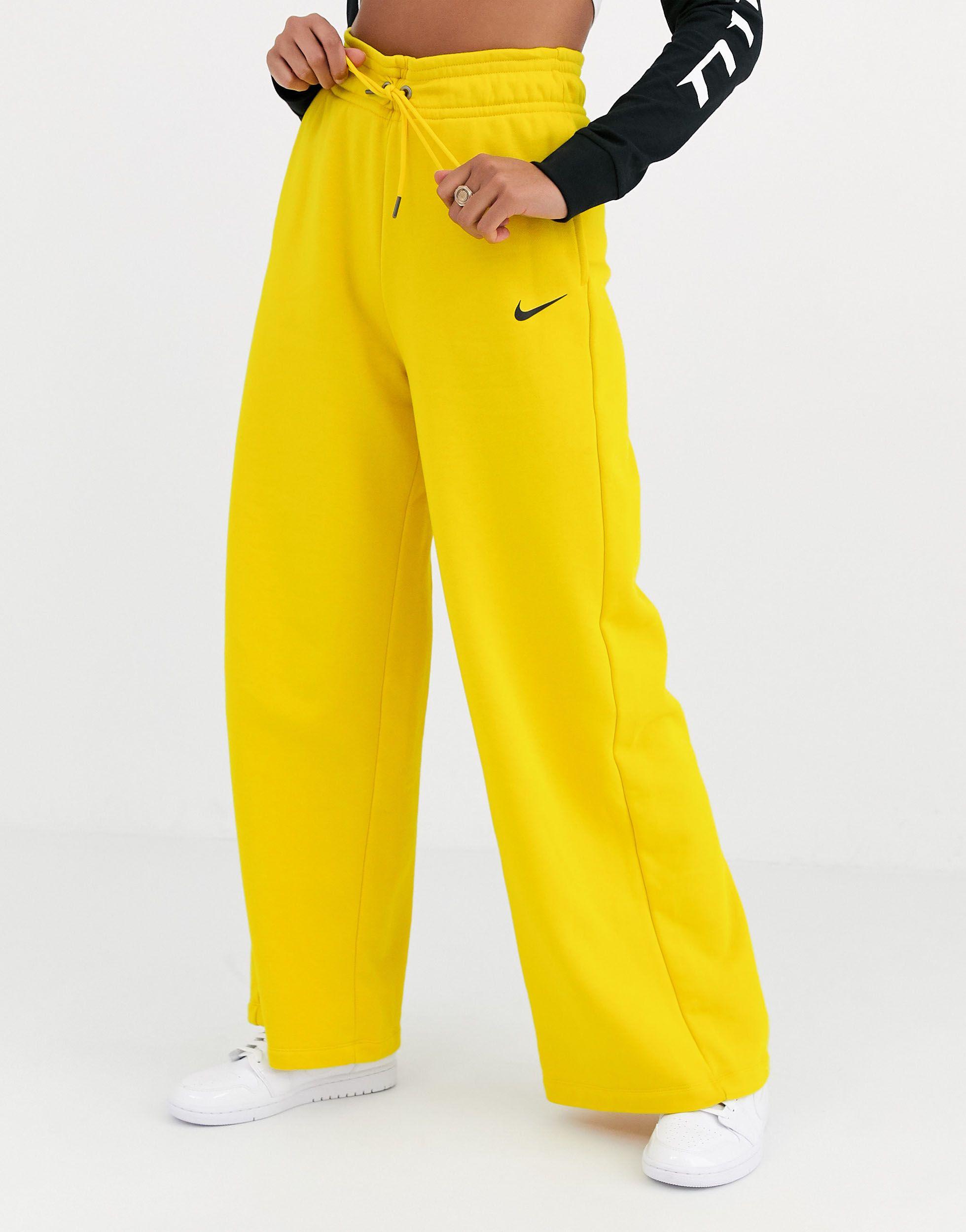Nike Baumwolle – Gelbe Jogginghose mit hoher Taille und weiten Hosenbeinen  in Gelb | Lyst AT