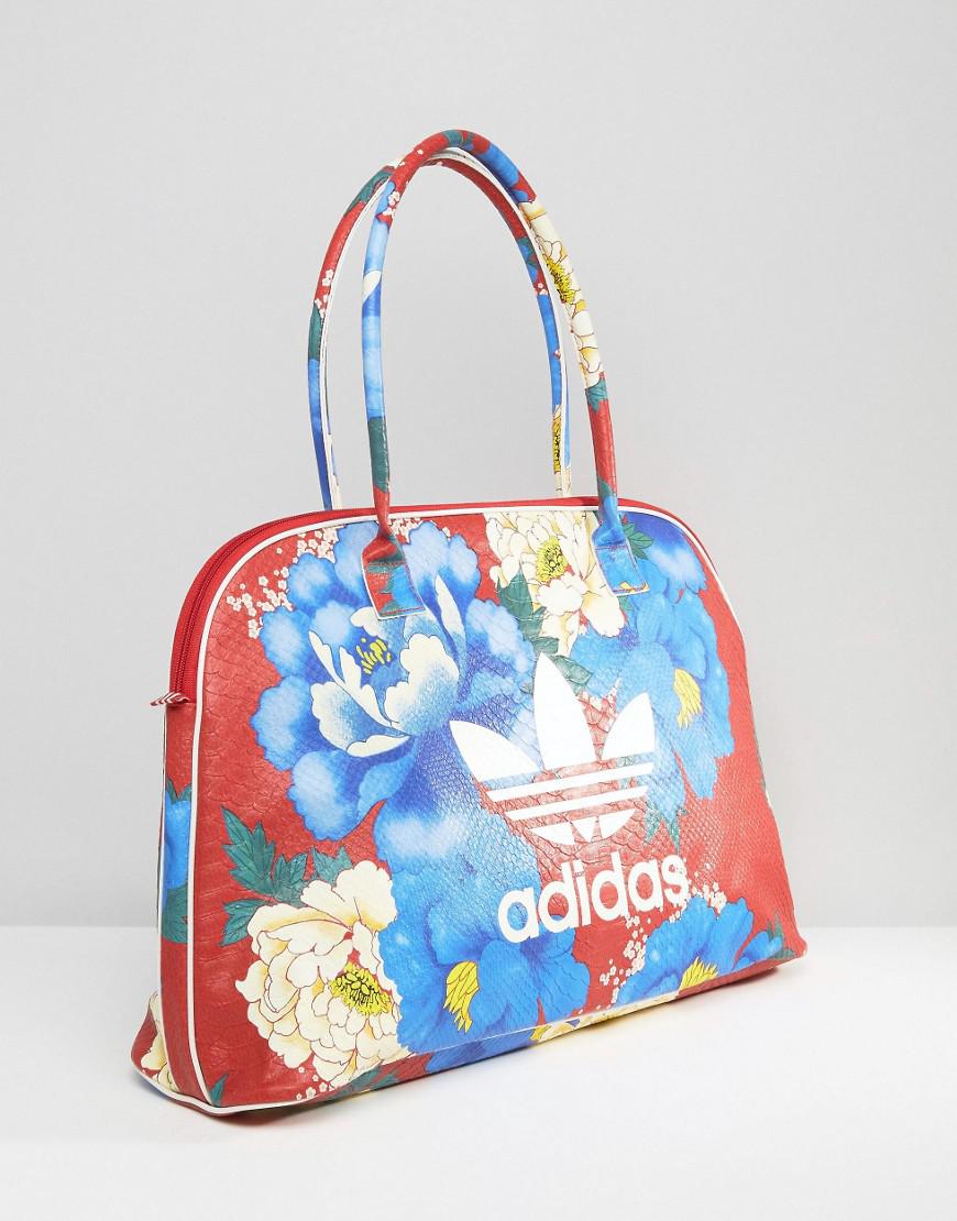 adidas Originals Originals Farm Print Travel Bag In Big Floral in Blue