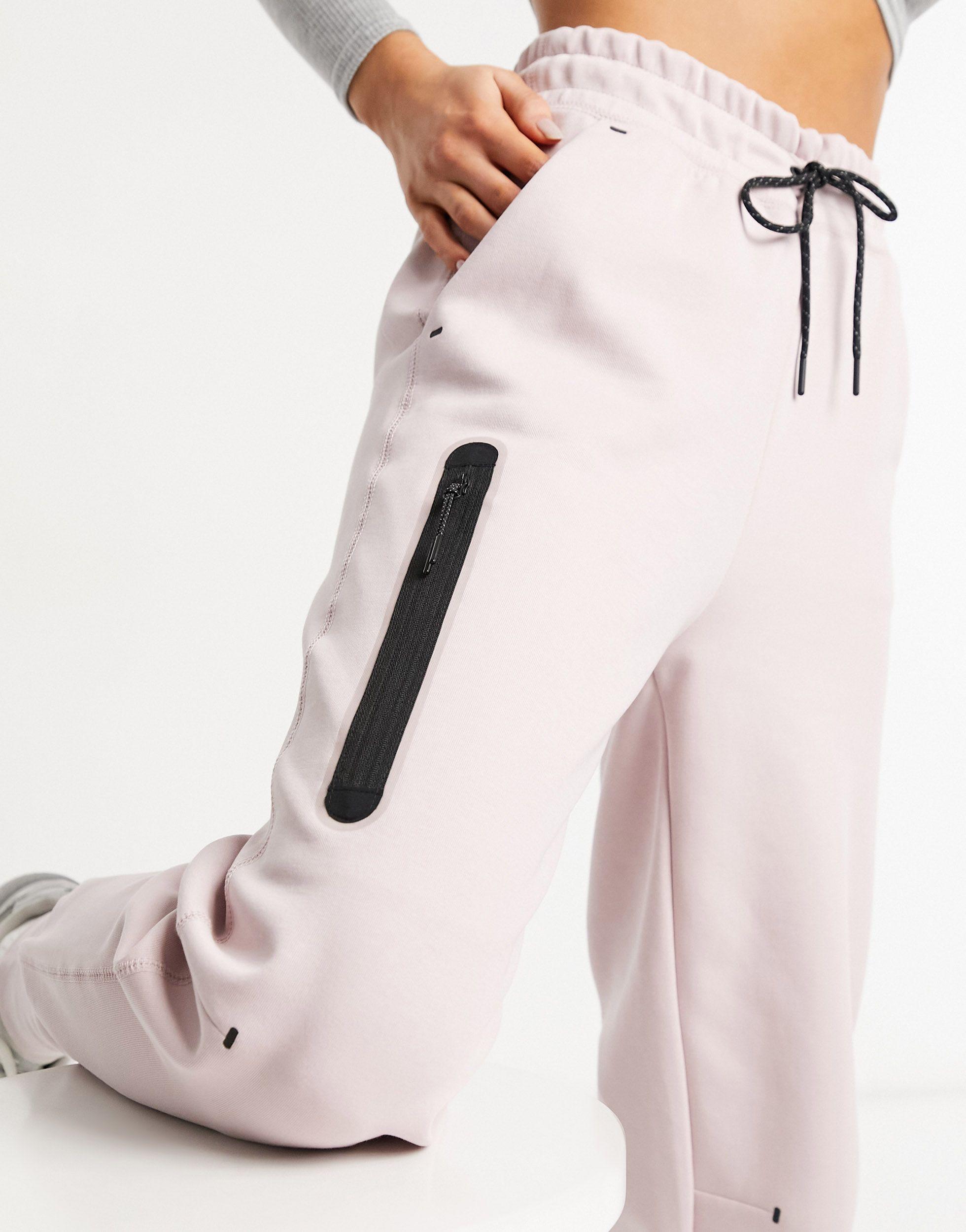 Zonnebrand Accor ontsmettingsmiddel Nike Tech Fleece joggers in Pink | Lyst