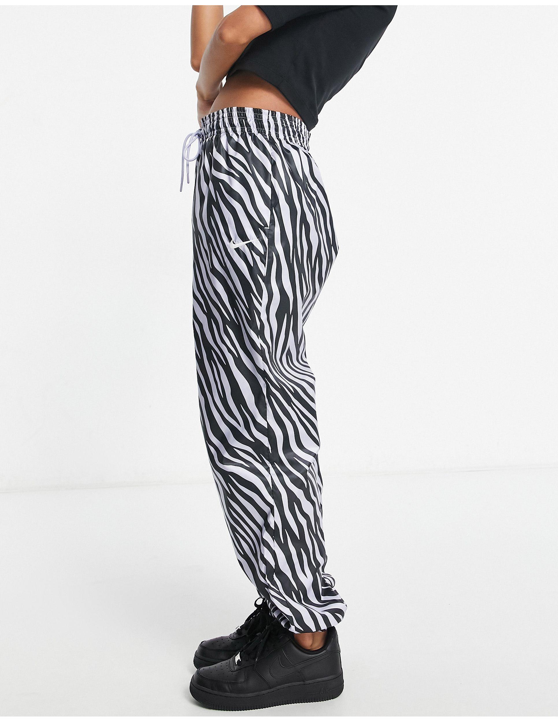 Icon clash - joggers zebrati di Nike in Viola | Lyst
