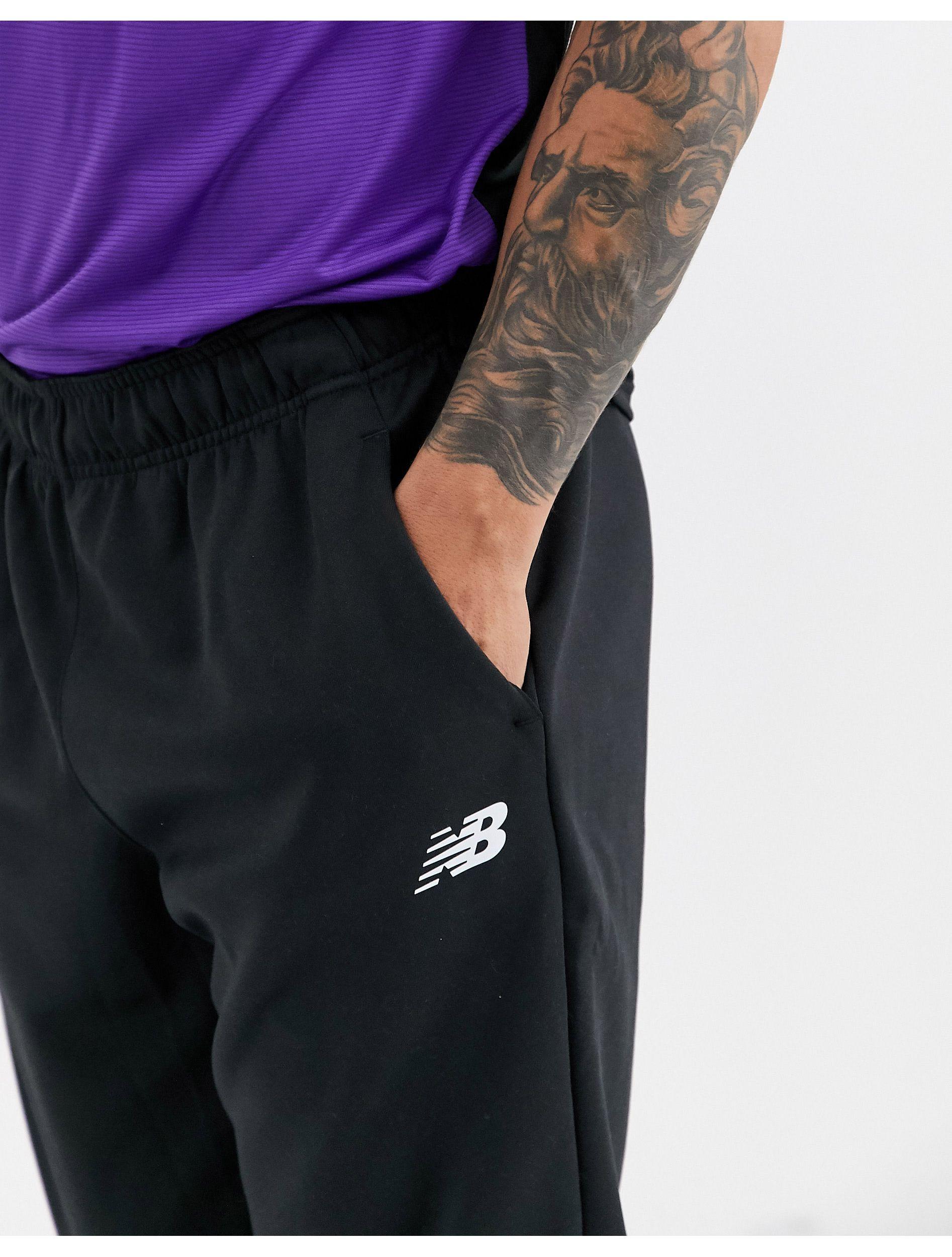 new balance running tenacity slim fit joggers in grey