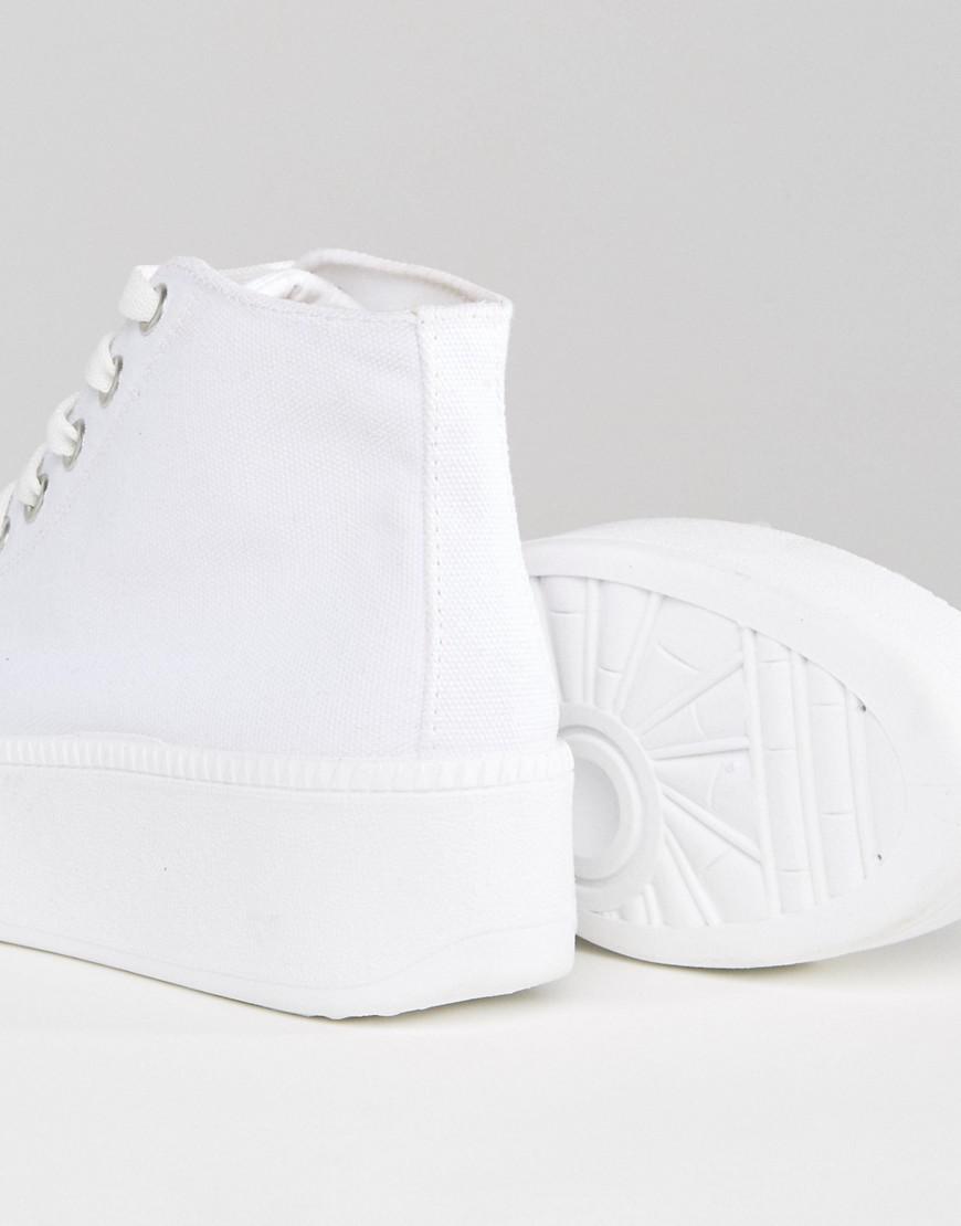 white chunky high top trainers