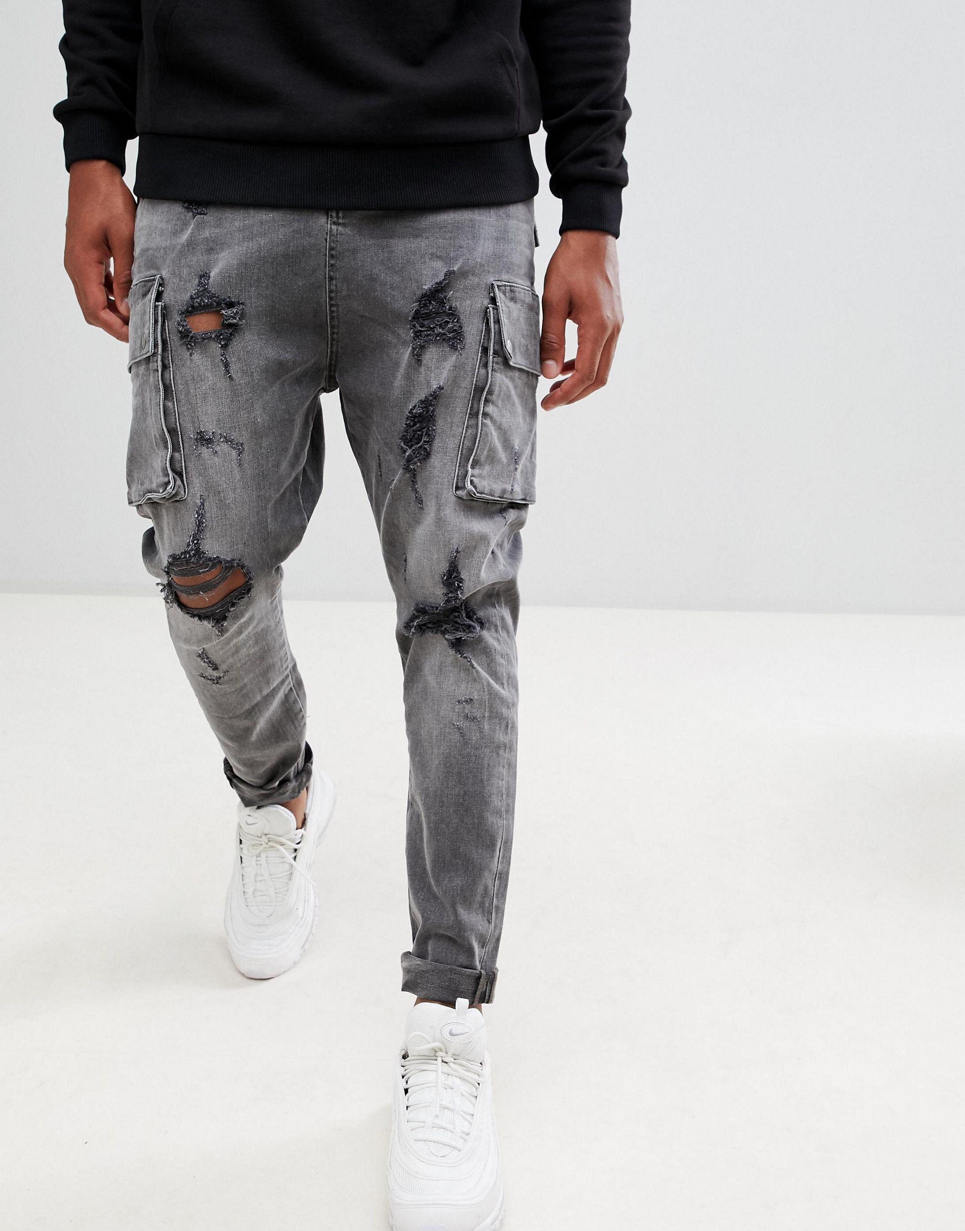 Jeans nero slavato strappati con cavallo basso e tasche cargoASOS in Denim  da Uomo colore Nero | Lyst