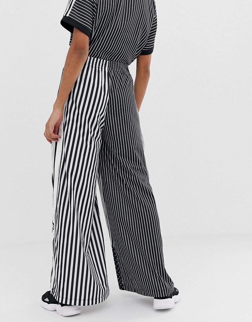 adidas Originals Synthetik Unterschiedlich gestreifte Hose mit Druckknöpfen  in Schwarz und Weiß in Schwarz - Lyst