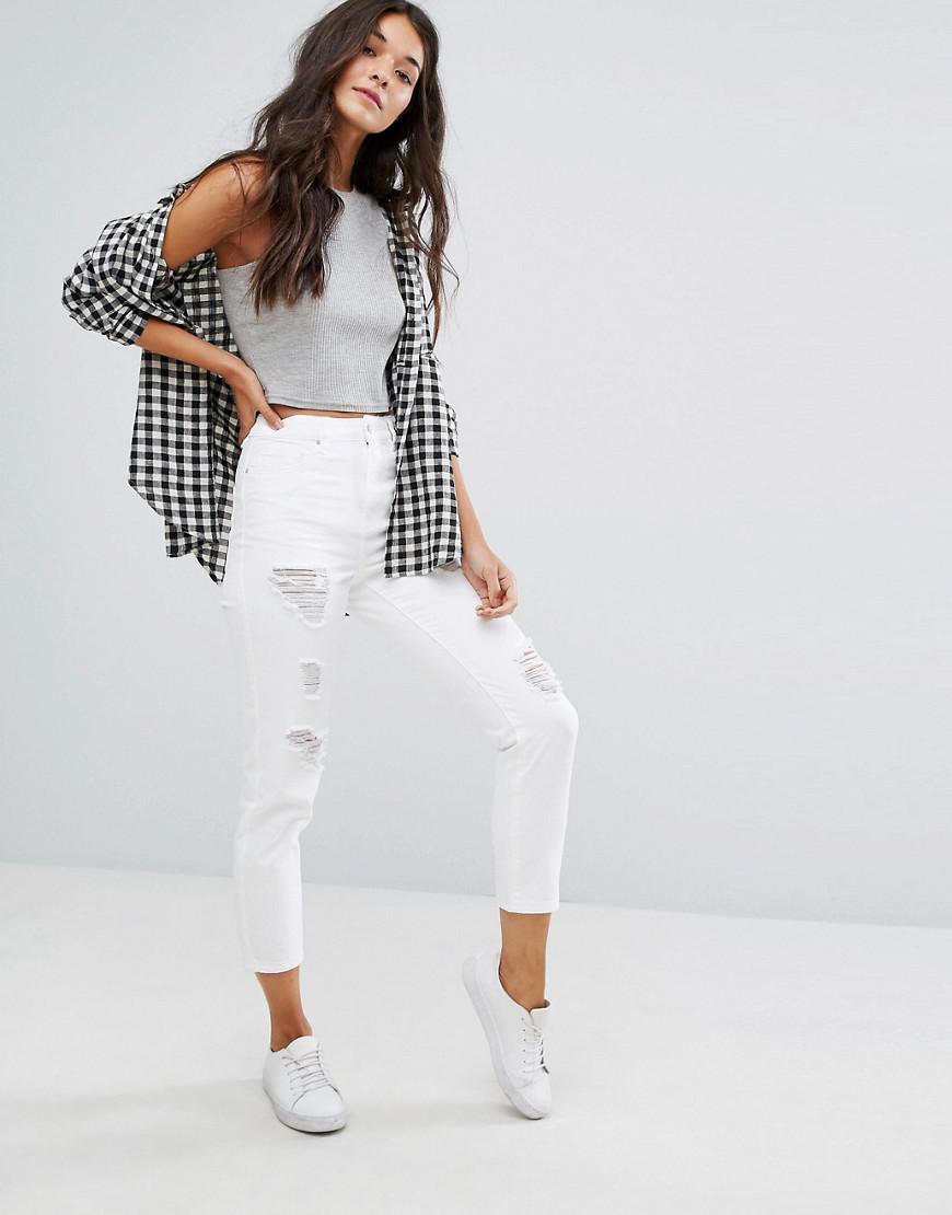 white mom jeans ripped