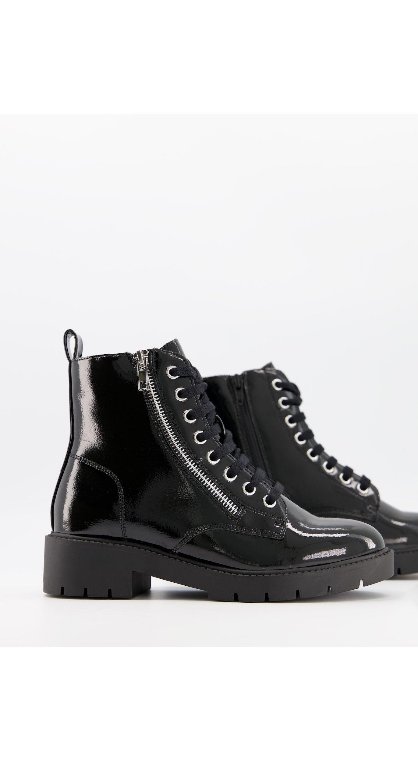 patent flat ankle boots