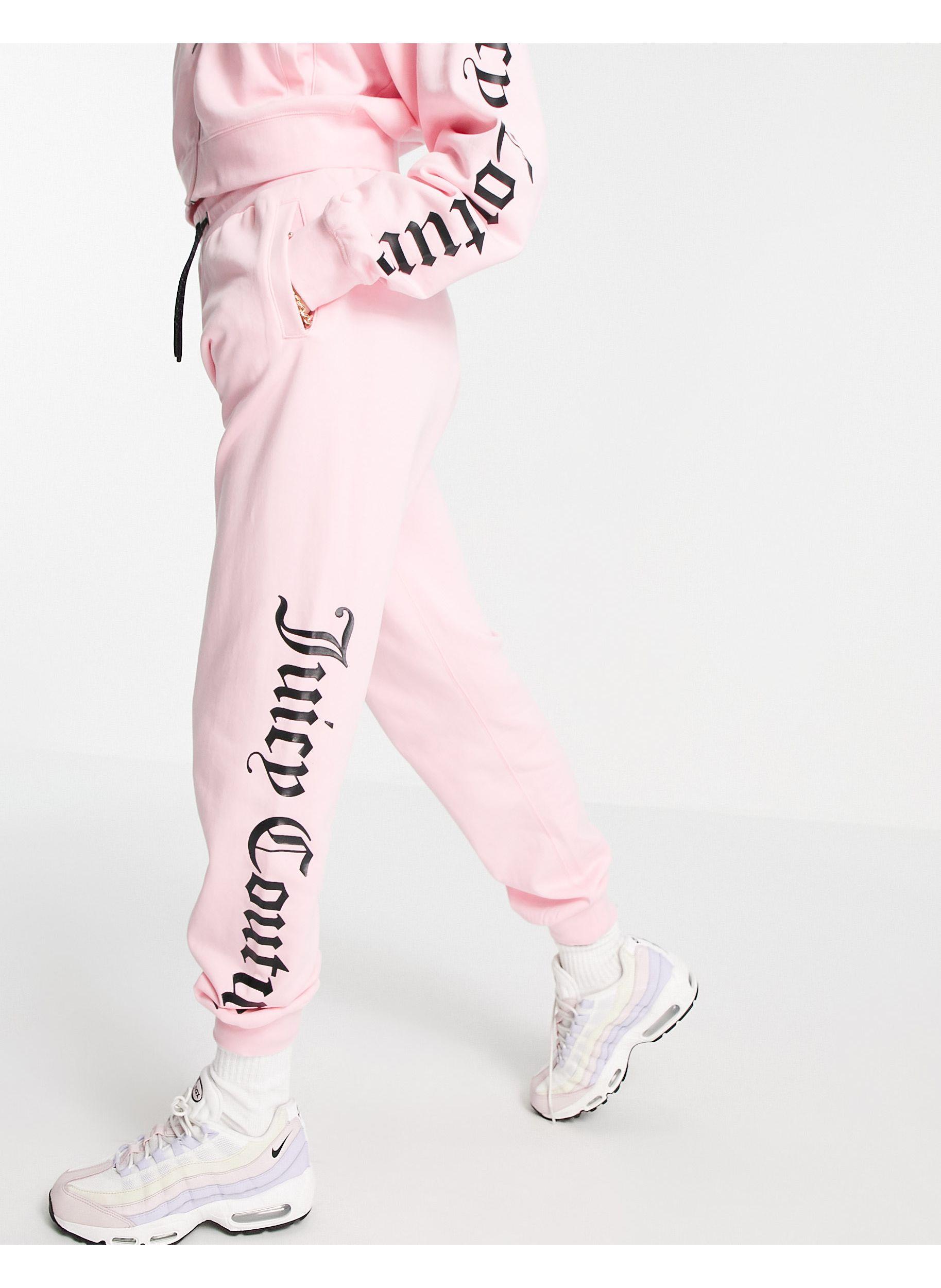Joggers con logo nero lucido di Juicy Couture in Rosa | Lyst