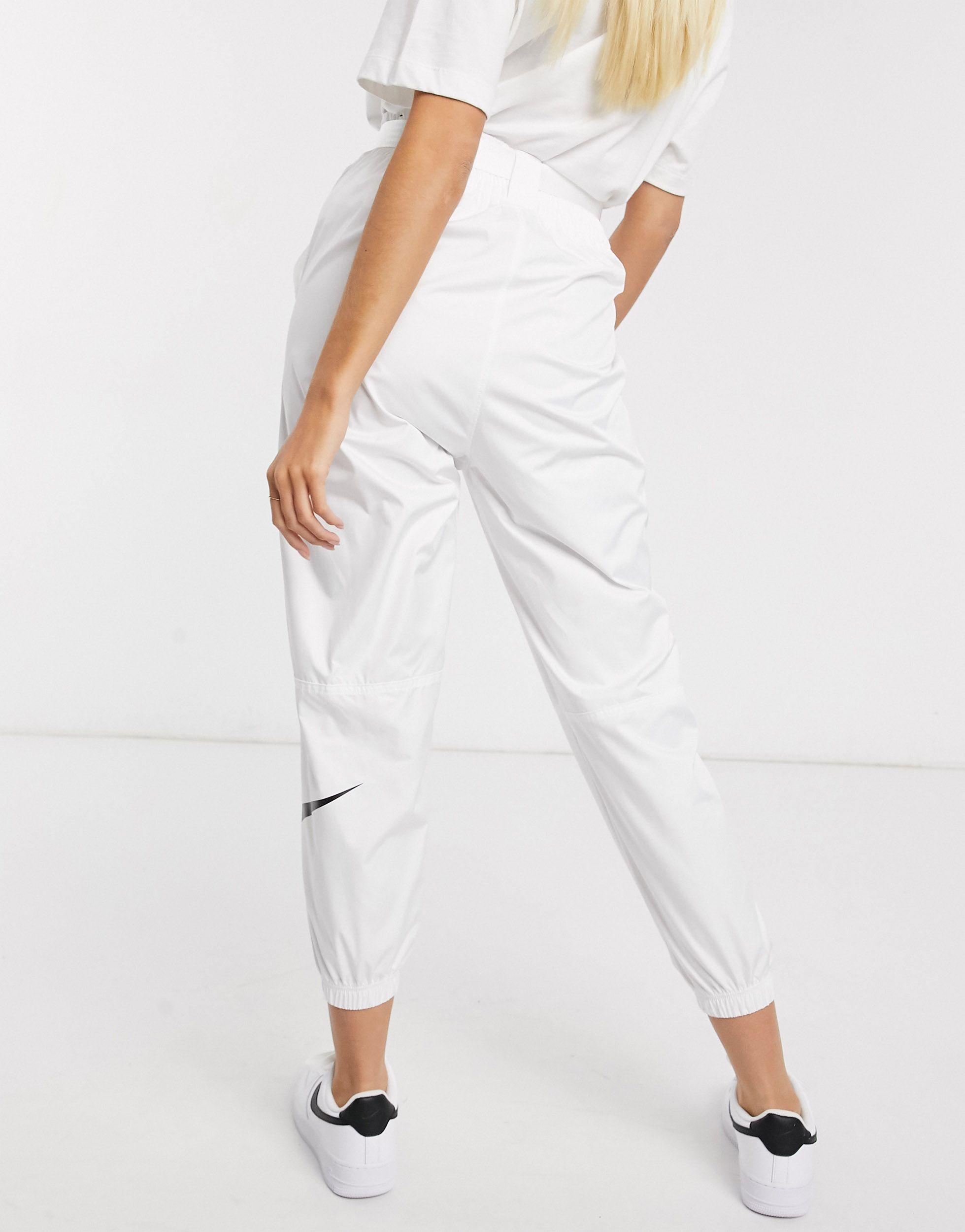 nike woven swoosh cargo pants with belt in black