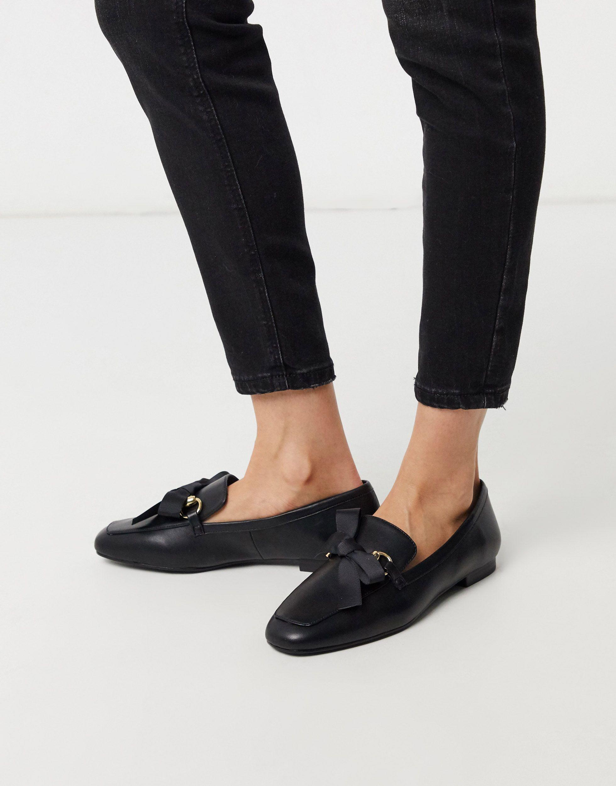 Mocasines planos negros con lazo Stradivarius de color Negro | Lyst